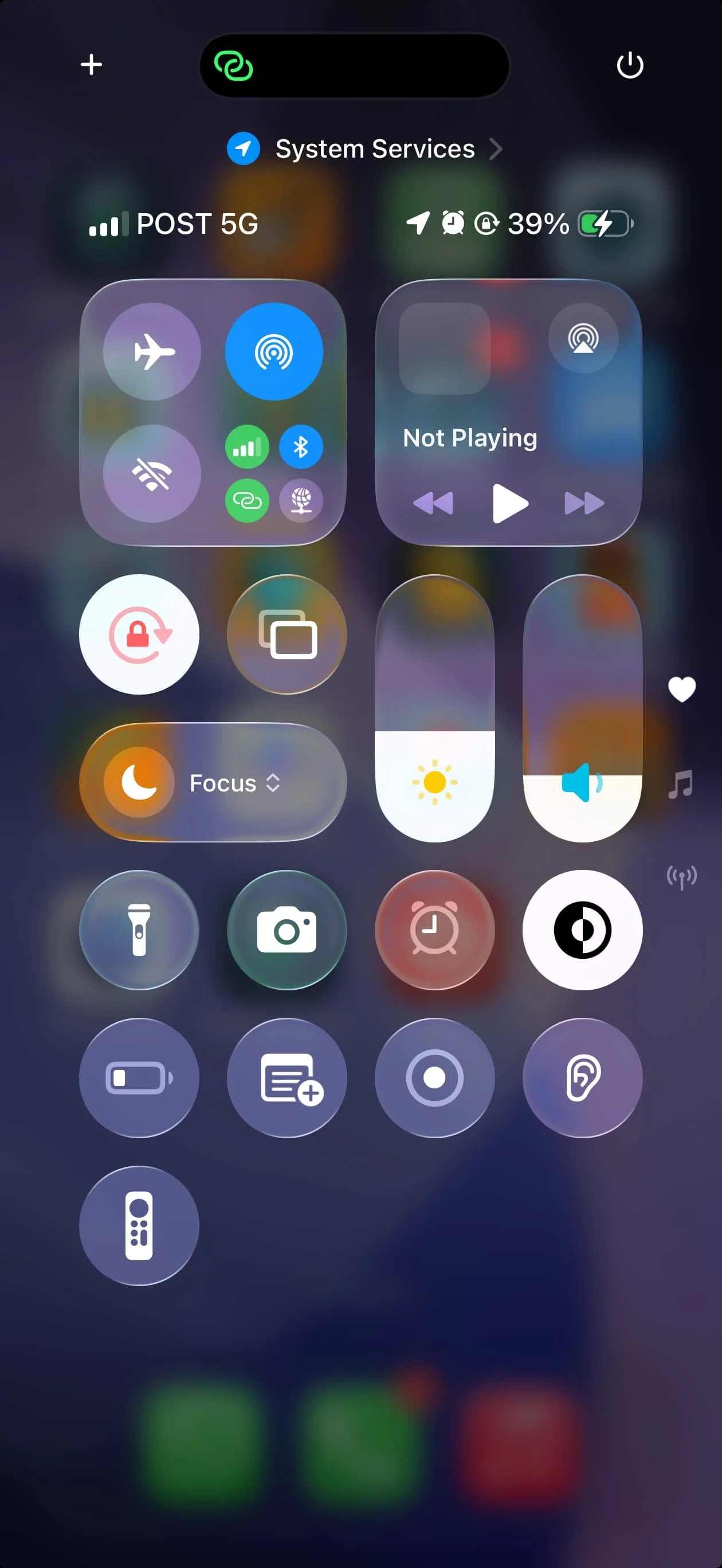 iPhone Display and Brightness settings screen with Dark mode selected and brightness slider at 50%