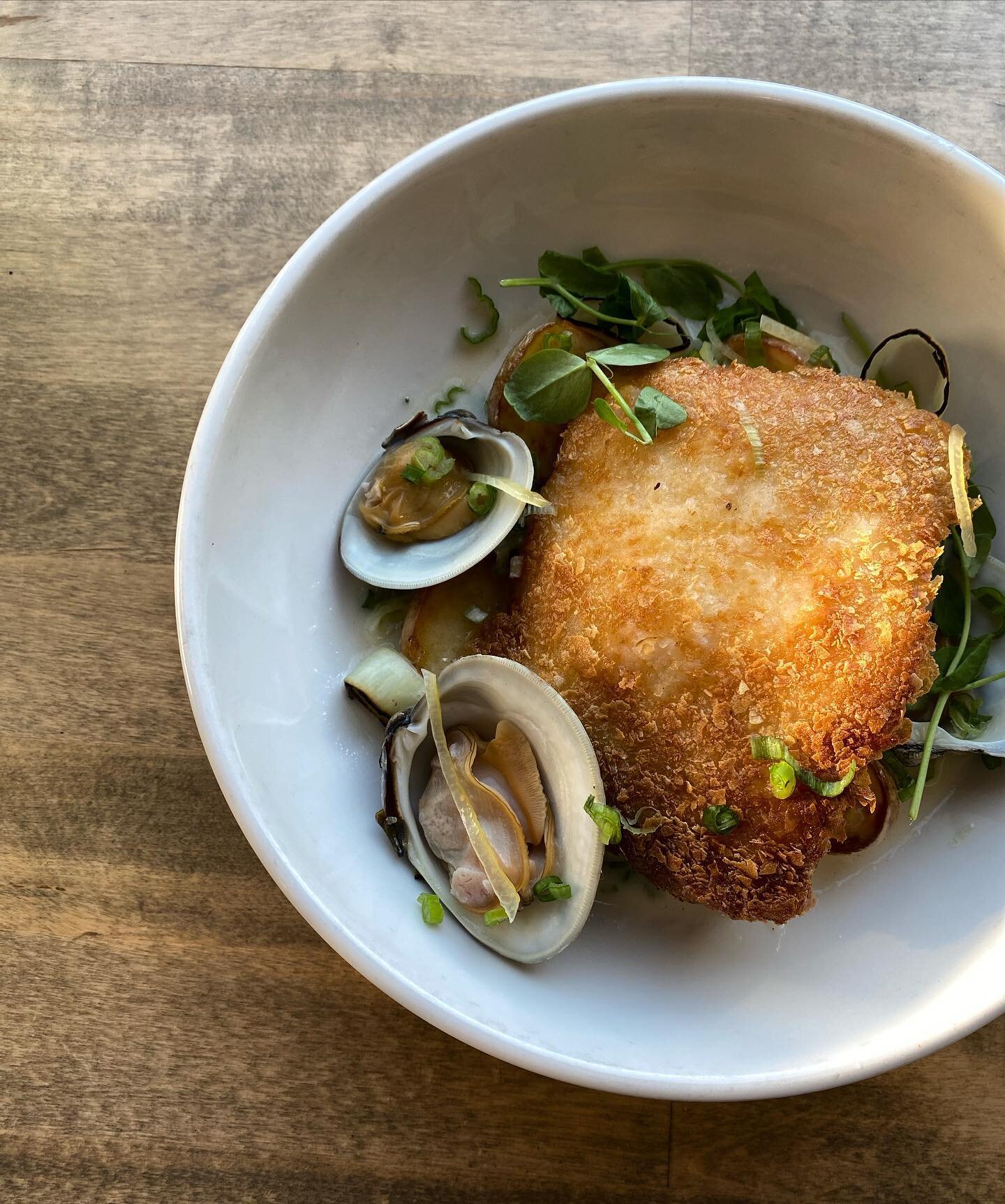 Hoping this potato-crusted cod (littlenecks, confit baby potatoes, charred leeks, + clam broth) is a welcomed ✨refresh ✨among all the sweet potatoes, brussels, &amp; cranberries on your feed. We love it all, but could use a little palate cleansing be