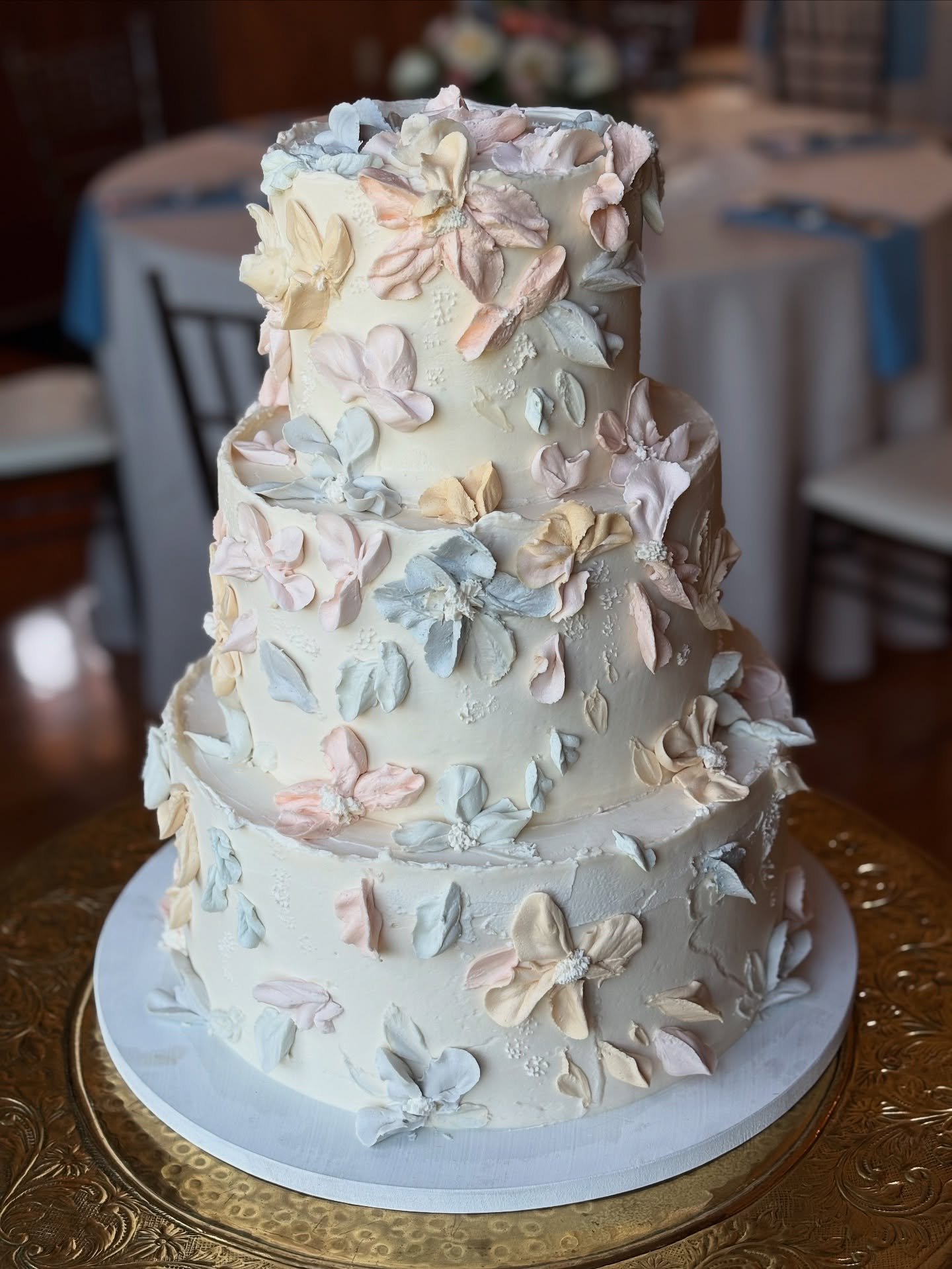 Soft neutral shades of buttercream petals for this wedding cake at Drumore estates. #drumoreestatewedding #bellamanse #cakesnearme