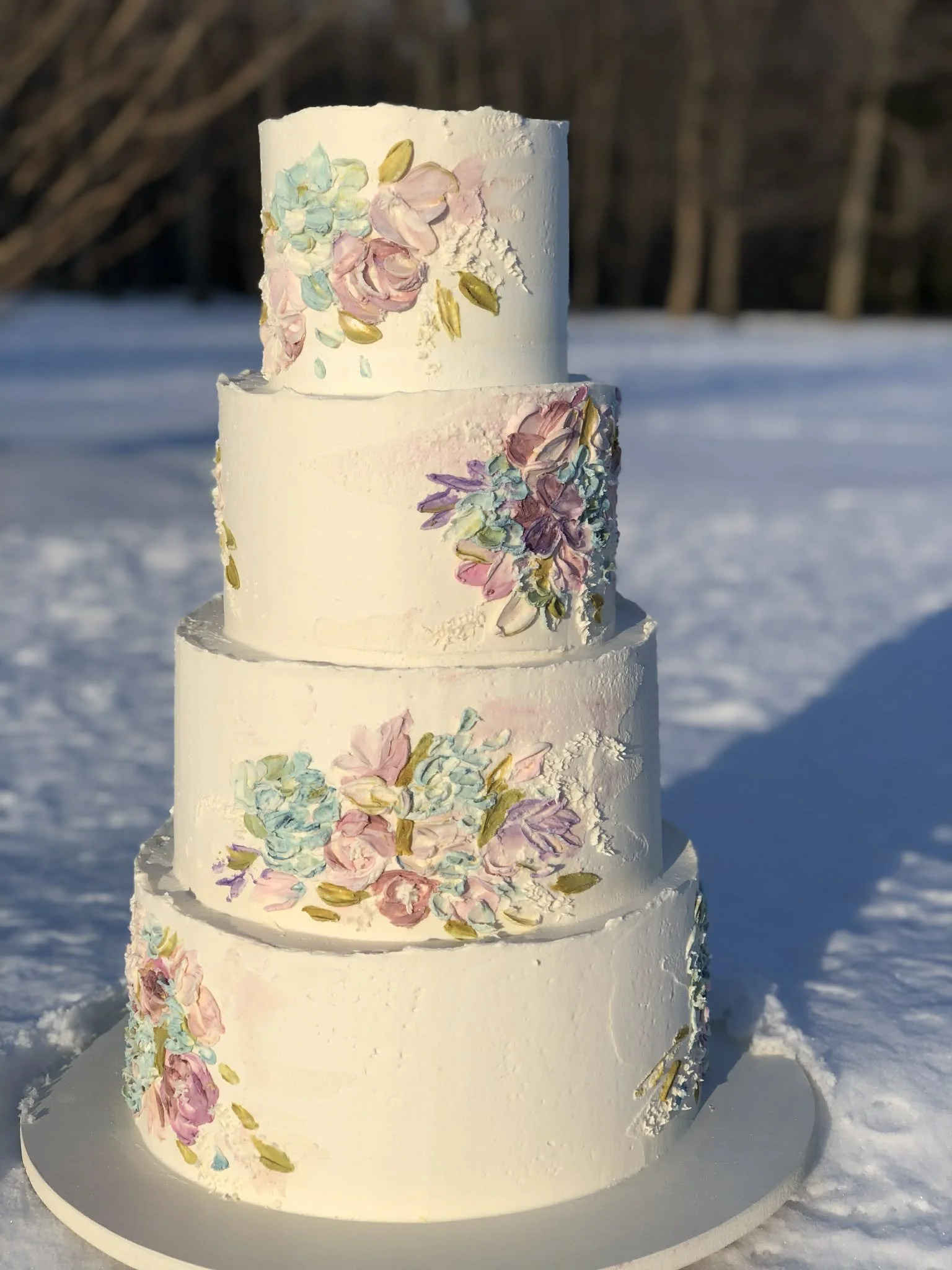 Winter florals in a 4 tier, palette knife cake