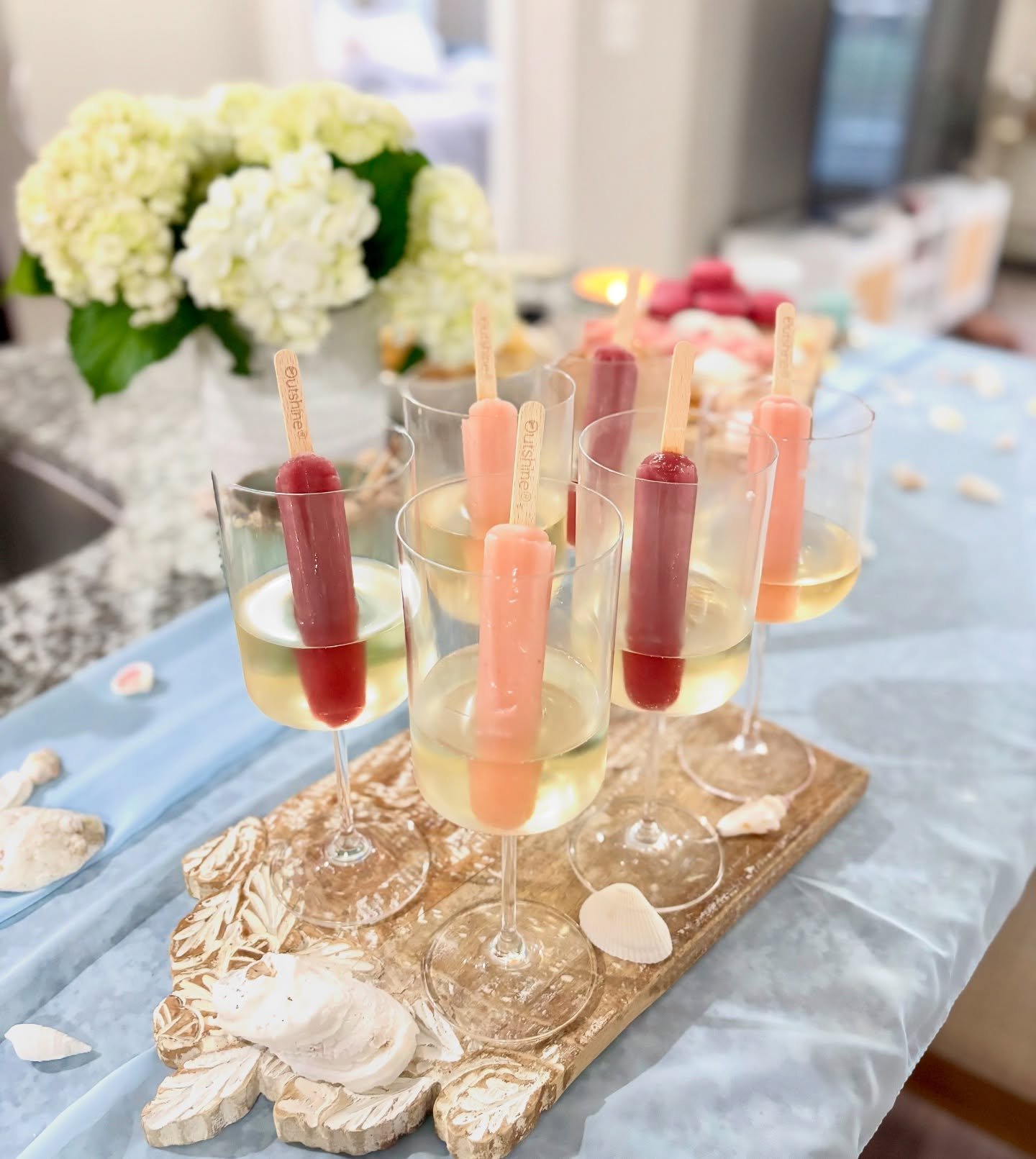 Emma&rsquo;s 24th calls for popsicles and prosecco with @lamarcaprosecco + @outshinesnacks 🐚🥂🎀🍧🩵