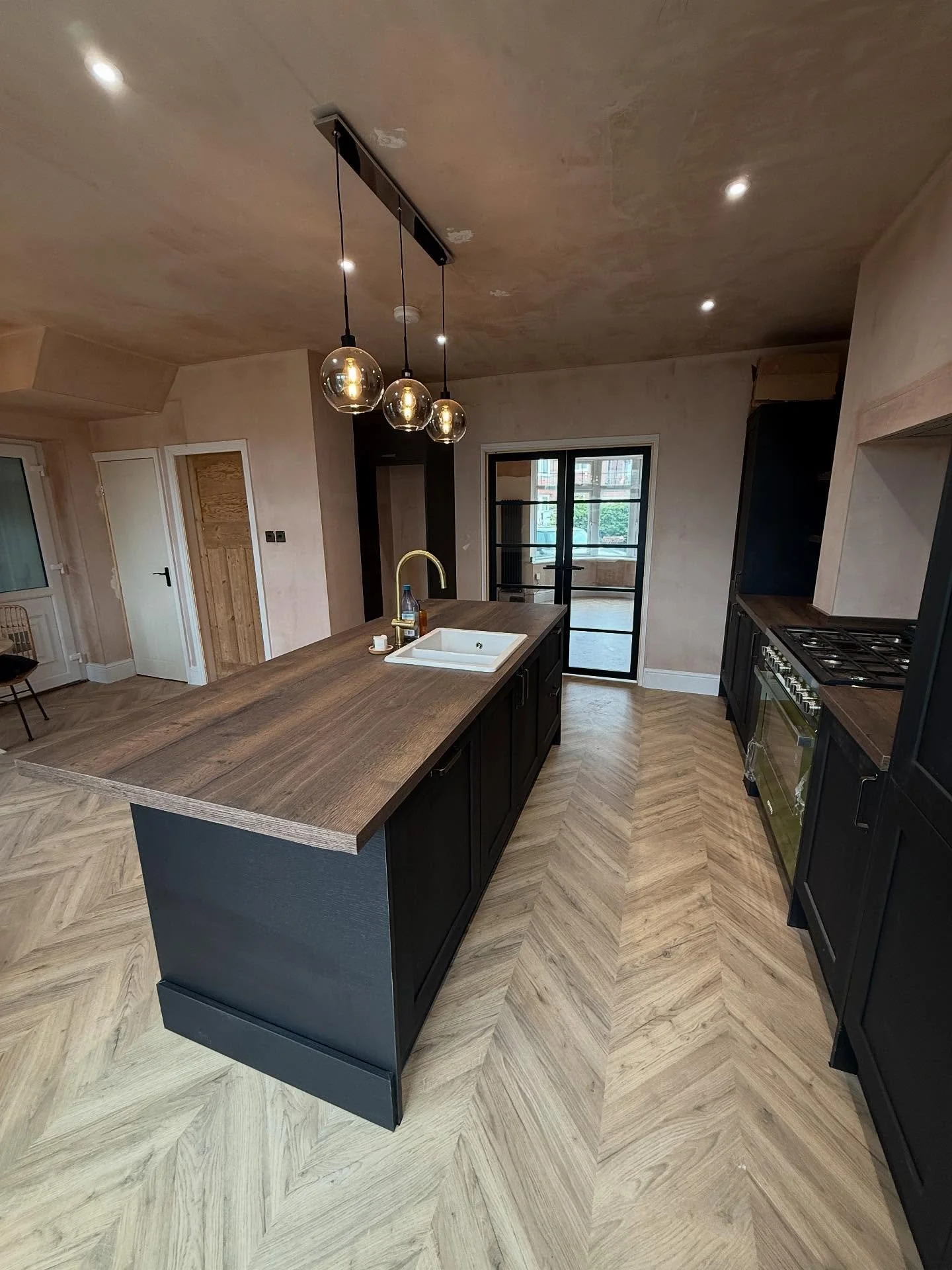 🏗️Our team recently delivered a full internal renovation, transforming a dated space into a modern, functional open-plan layout. 

Scope of works included:

✔️ New kitchen installed 
✔️ Wood flooring installed 
✔️ Doors and Skirting 
✔️ Full electri