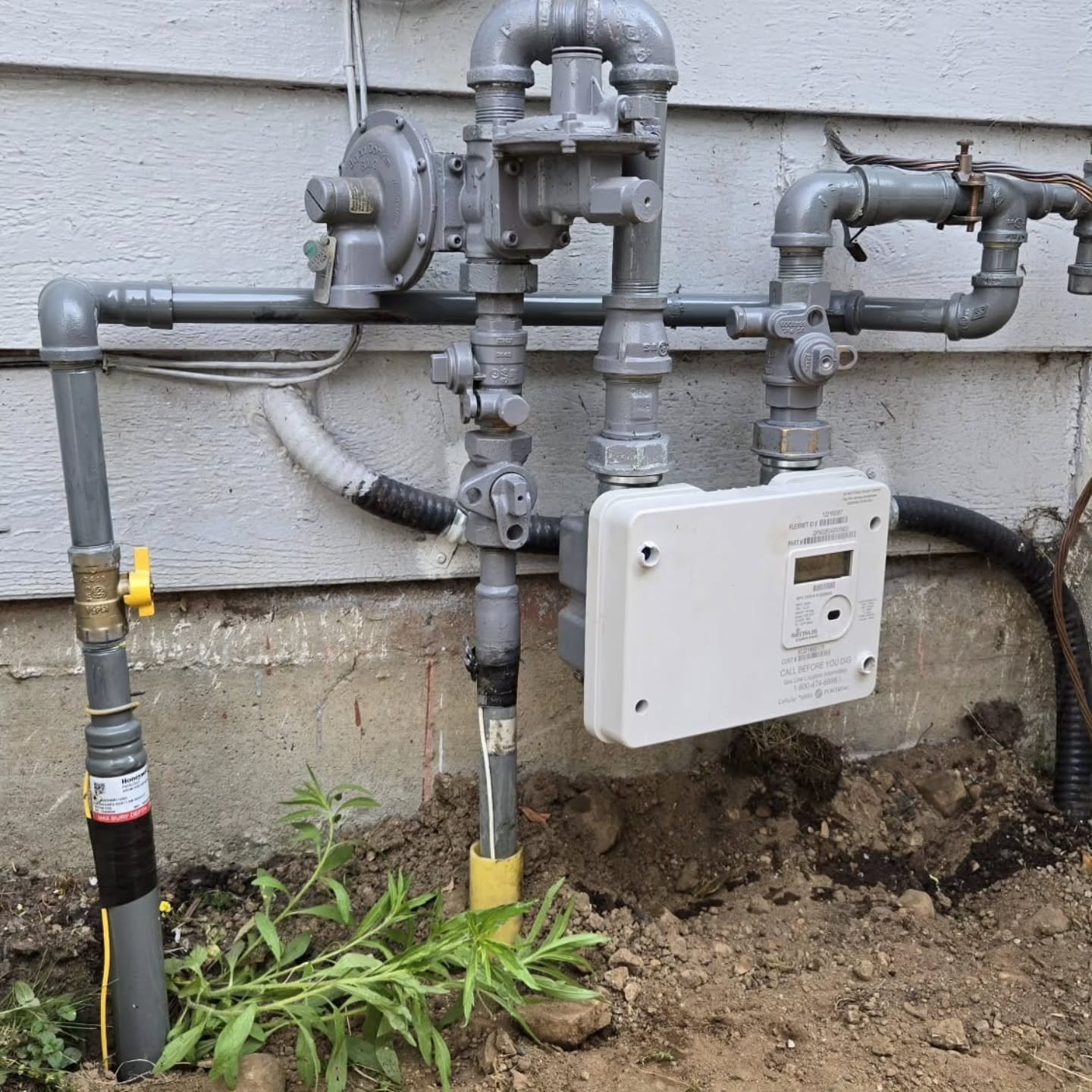 Another underground gas main, from the meter to a bbq, and then to a detached workshop in the backyard of this Coquitlam home