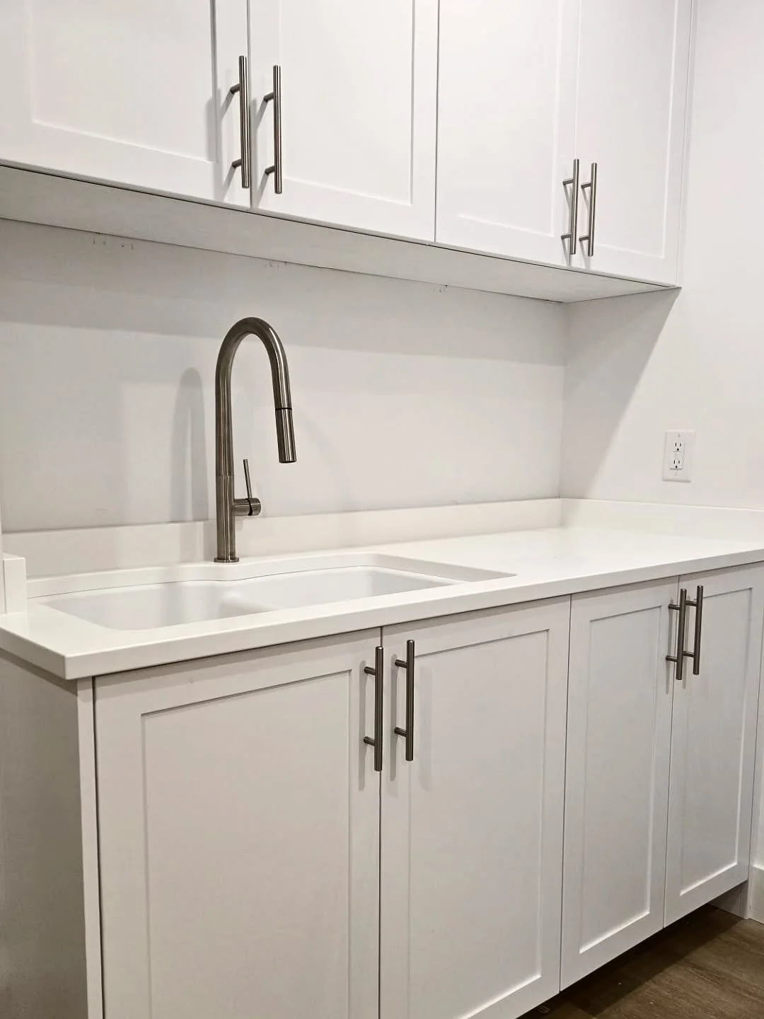 Laundry sink and faucet installed for this Vancouver suite reno