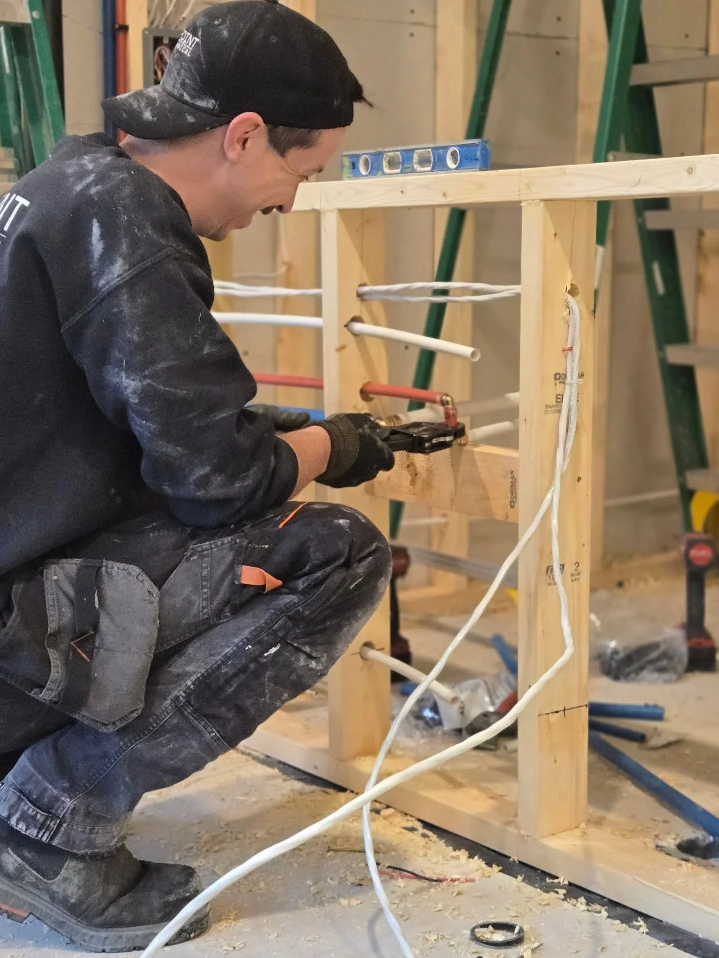 Cody having a good time bringing water over to the new kitchen sink location. We brought a 3/4" cold line to the sink where it will tee off in the cabinet and supply 2 hose-bibs with valves for winter shutdown. 

One of our North Vancouver proje