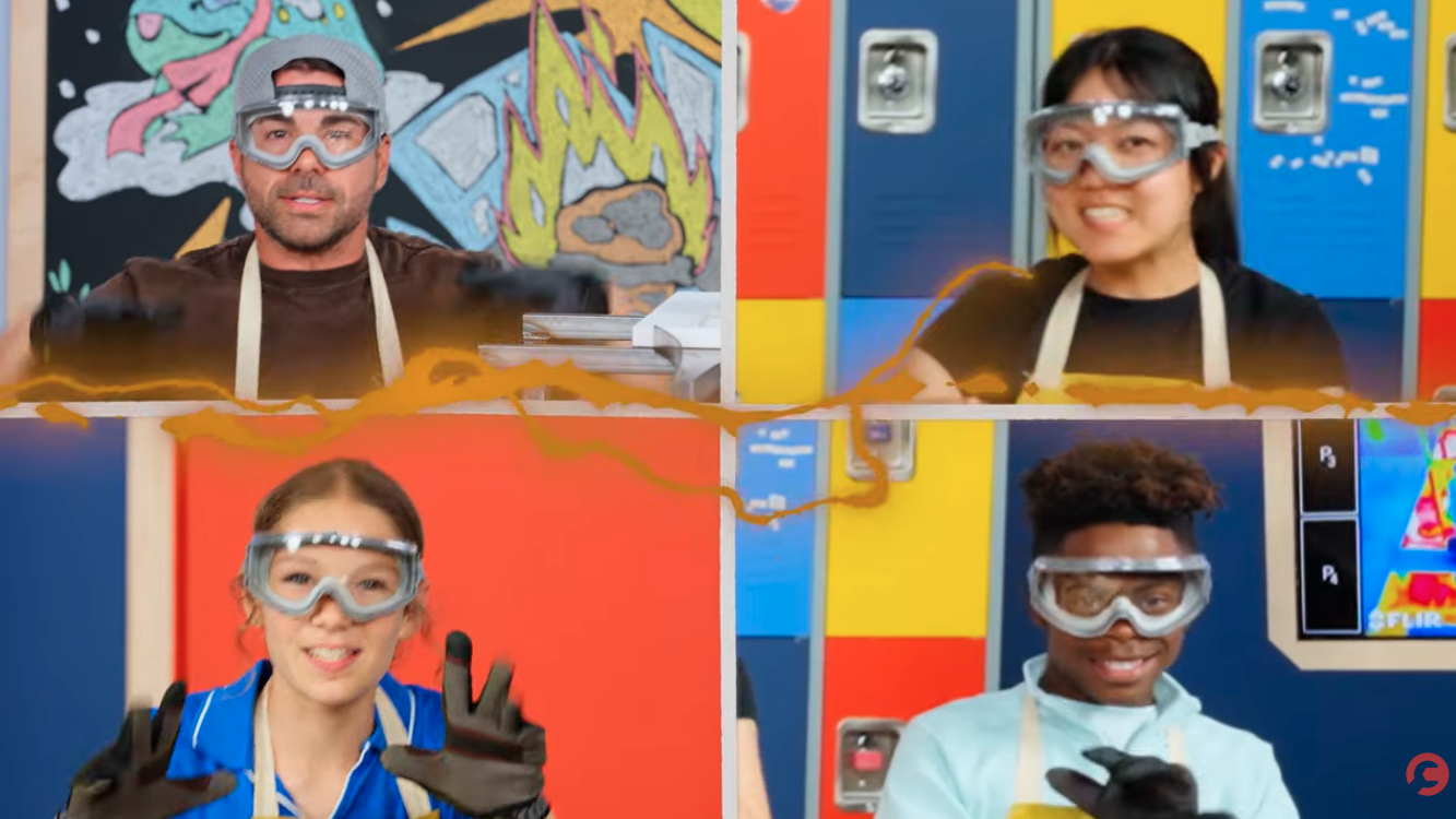 Mark, Bam, Trina, and Micah are all wearing safety goggles and waving their hands at the camera