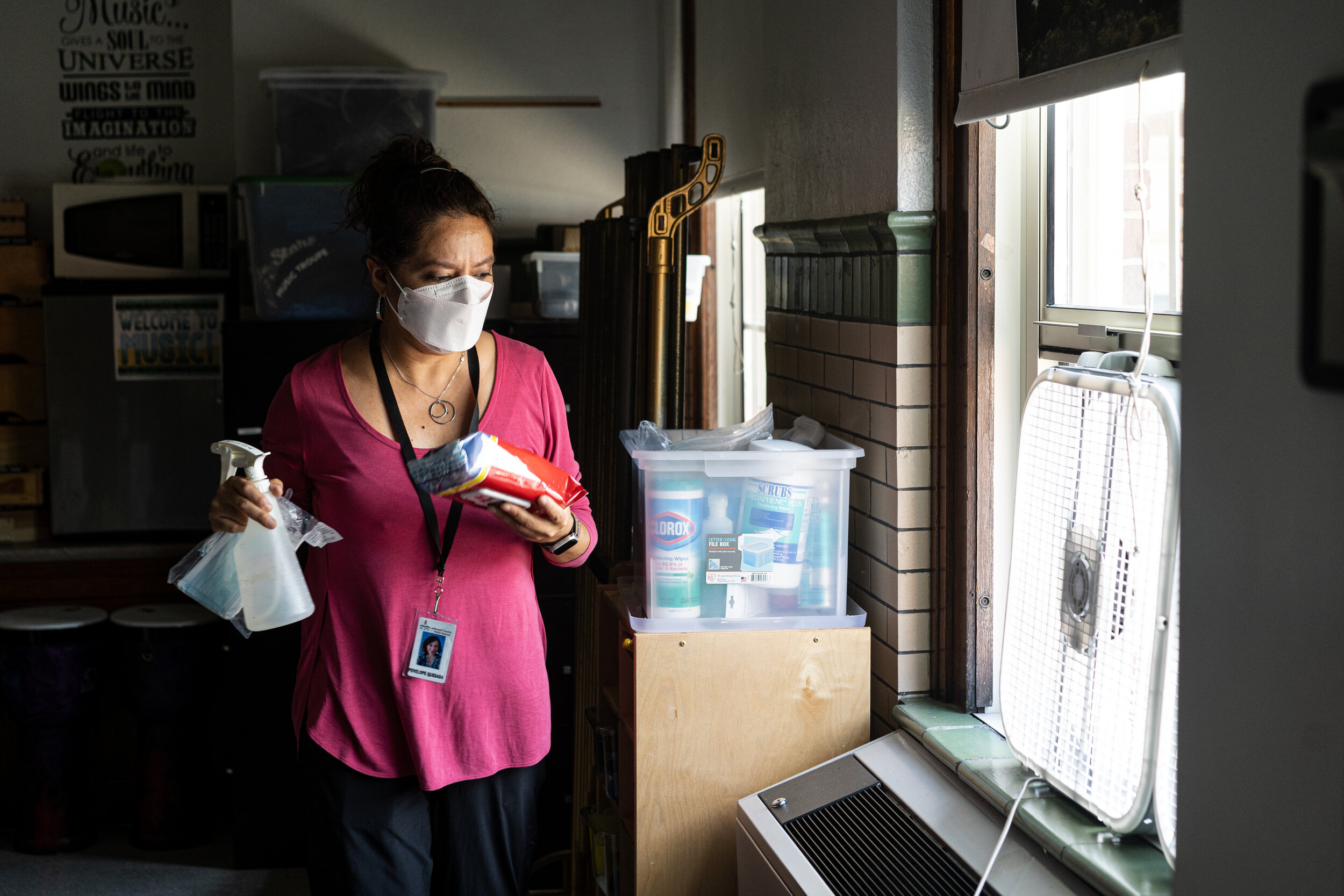Before classes begin for the day, elementary music teacher Penelope Quesada gathers her most commonly used cleaning supplies and places them around the classroom in places of convenience.