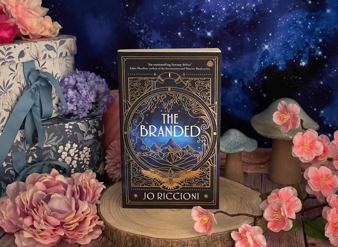 Only one month until The Branded hits shelves in the UK and US. Can&rsquo;t wait to share Nara, Osha, Brim and the Wrangler with the world. Just look at this beautiful styling by @escape.into.books 
@angryrobotbooks