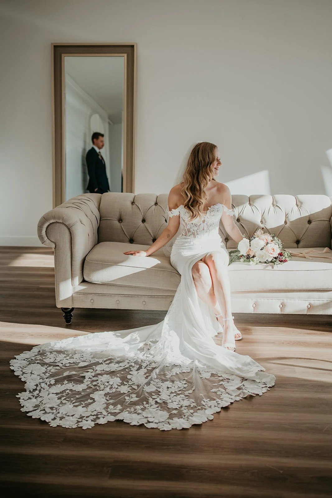 Bride seated with her bouquet at River Valley wedding venue during styled shoot