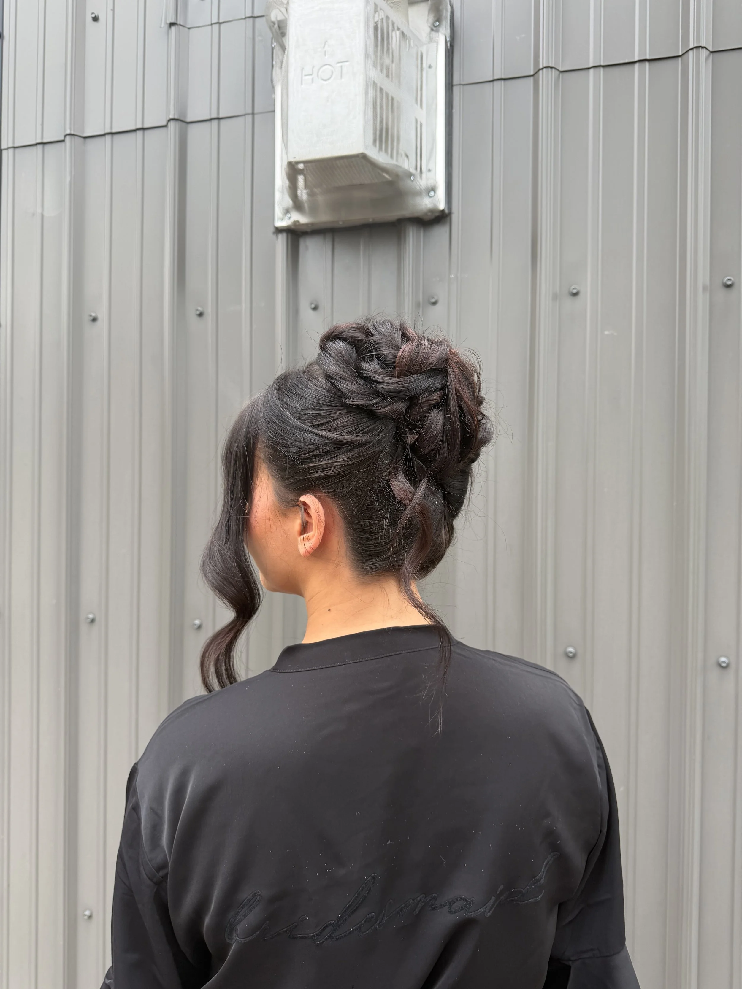Romantic textured bridal updo created by Danielle Aichelle Artistry for a wedding in Central Alberta