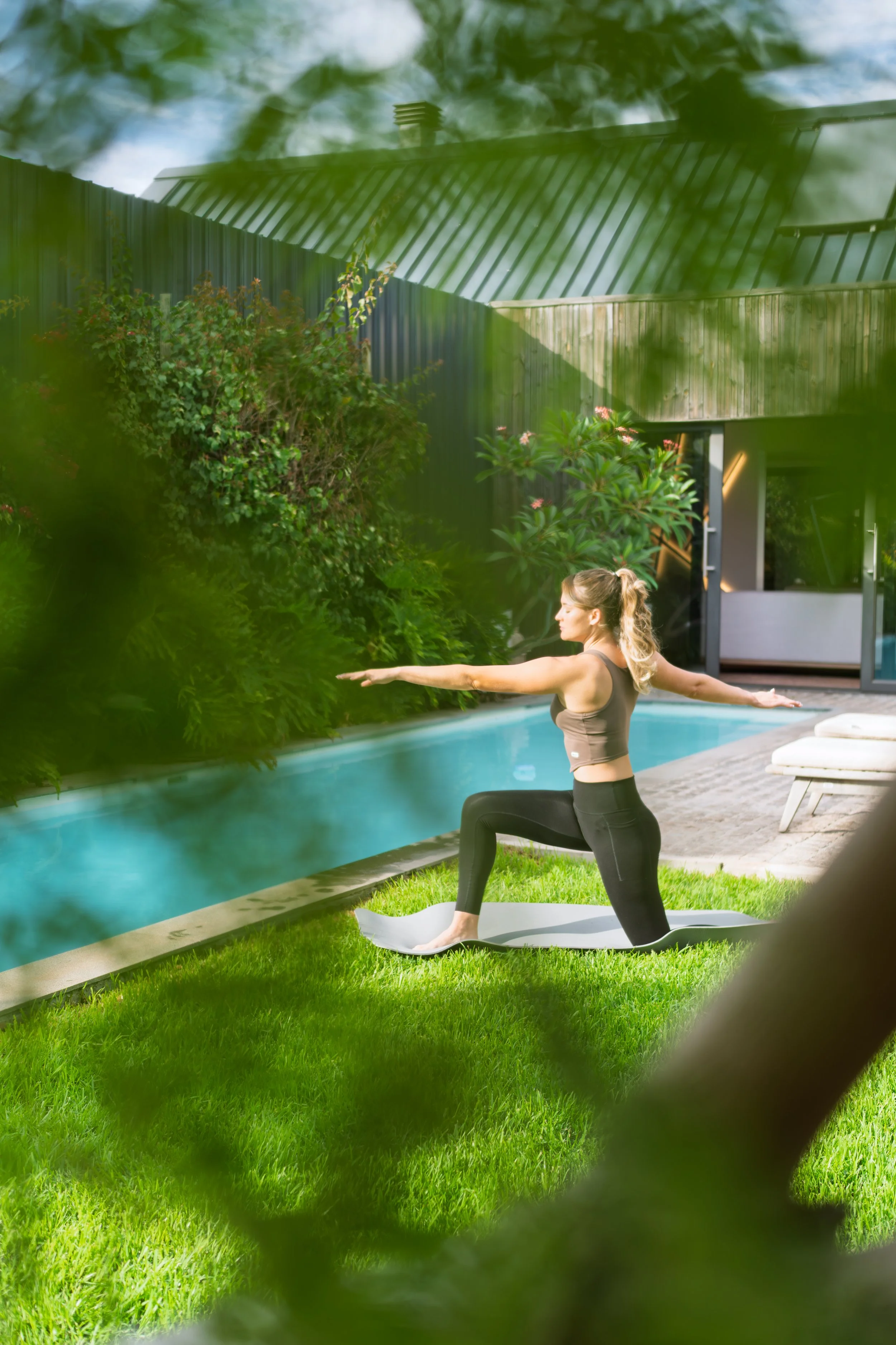 Women doing yoga at a 5 start lxuury boutique hotel