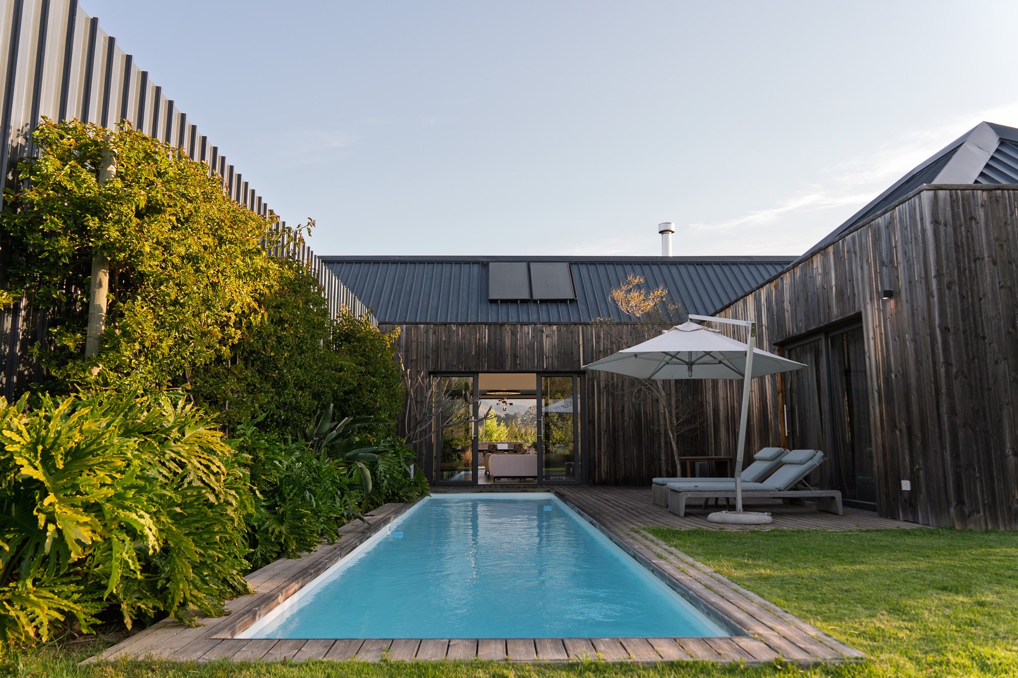 Private luxury villa with swimming pool at Ludus Magnus 5 star luxury boutique hotel overlooking the Franschhoek Winelands.