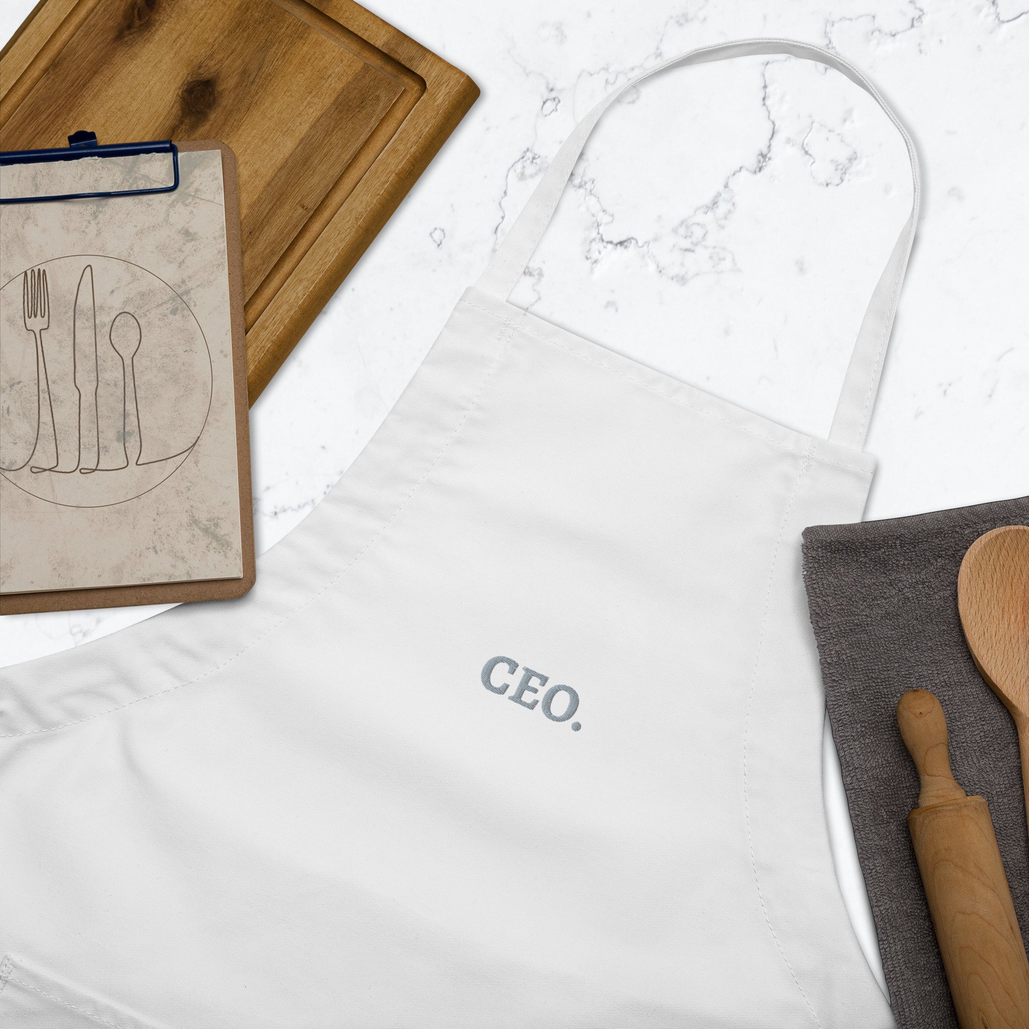 embroidered-apron-white-zoomed-in-62a379310f9bf.jpg