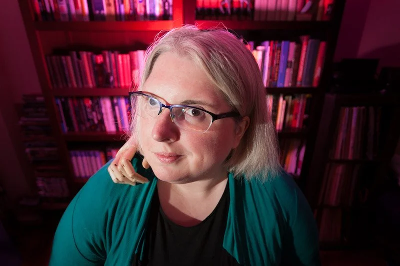 Image of Ariel Baska -white woman with short blonde hair and black glasses