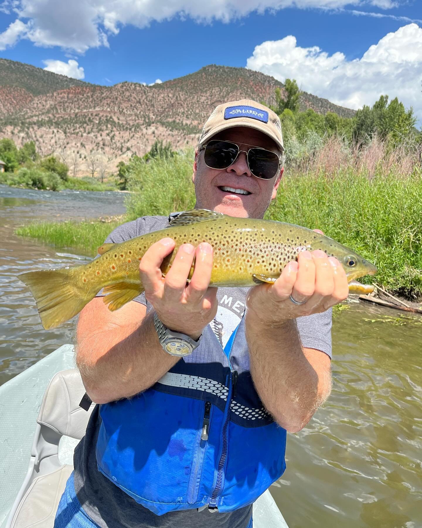 Big fish bring big smiles:)). This beautiful brownie swam several feet out of its way to eat a hopper!  As we get into runoff we can&rsquo;t help but think what&rsquo;s to come.  Call today to book!  970-485-2093