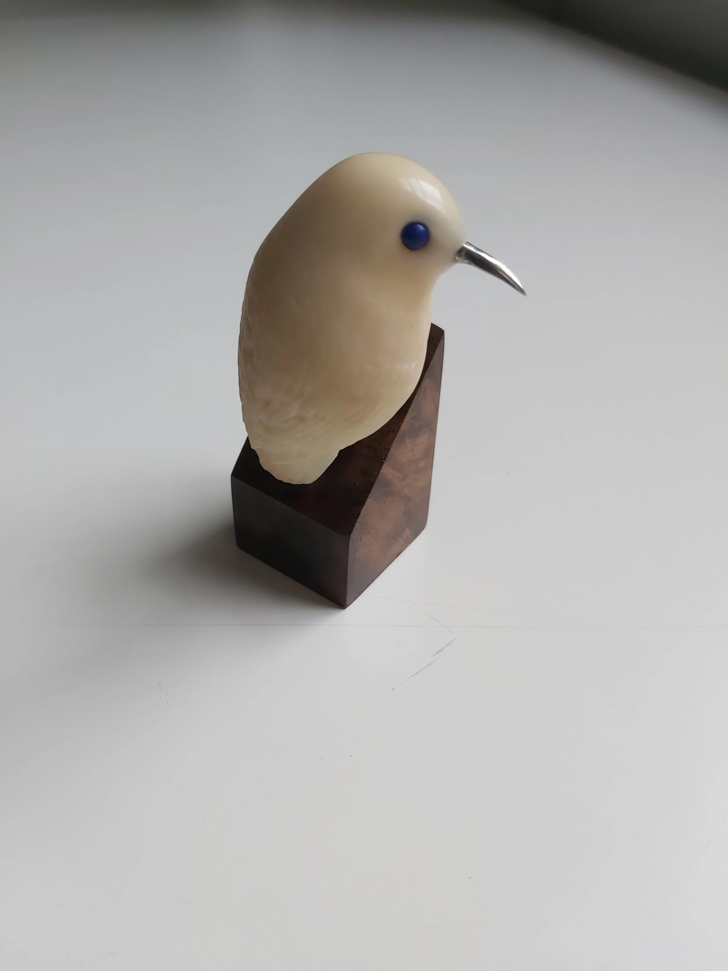 "Treecreeper", Tagua, silver, lapis lazuli, walnut .
(sold)