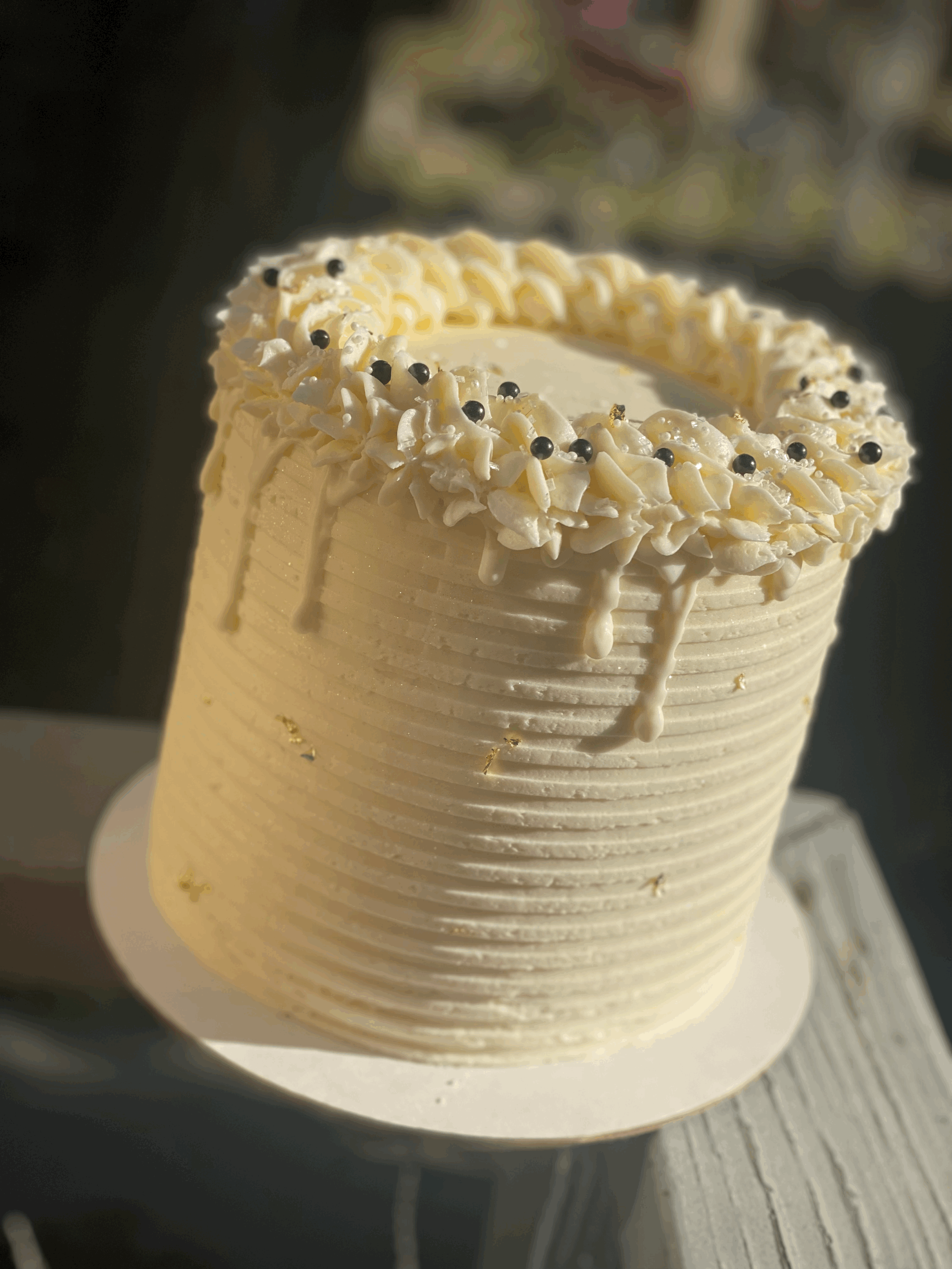 French Kissed Cake: French Vanilla Cake Layers White Chocolate Whipped Cream filling French Vanilla Buttercream Frosting