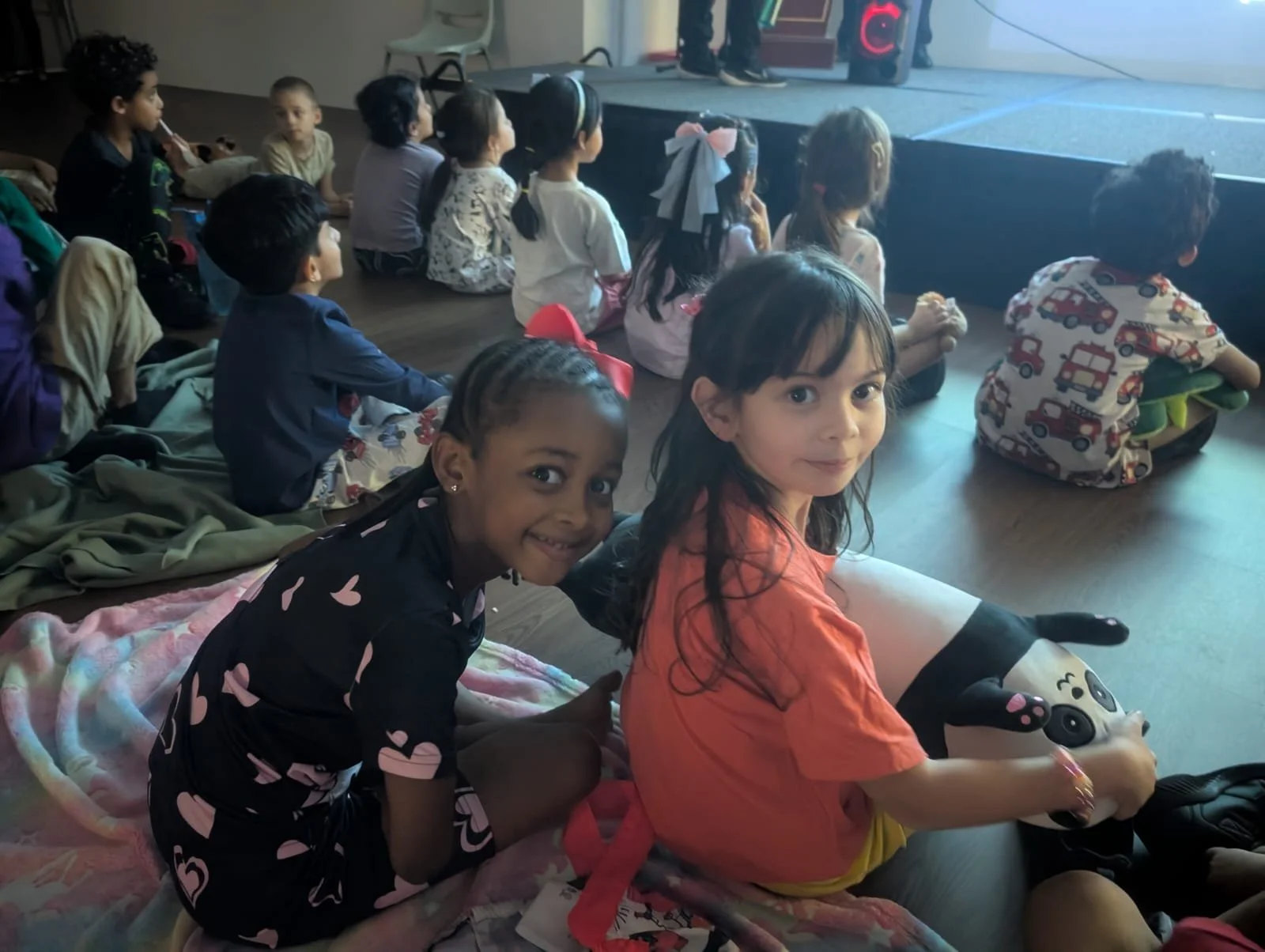 k12 students enjoying movie in school