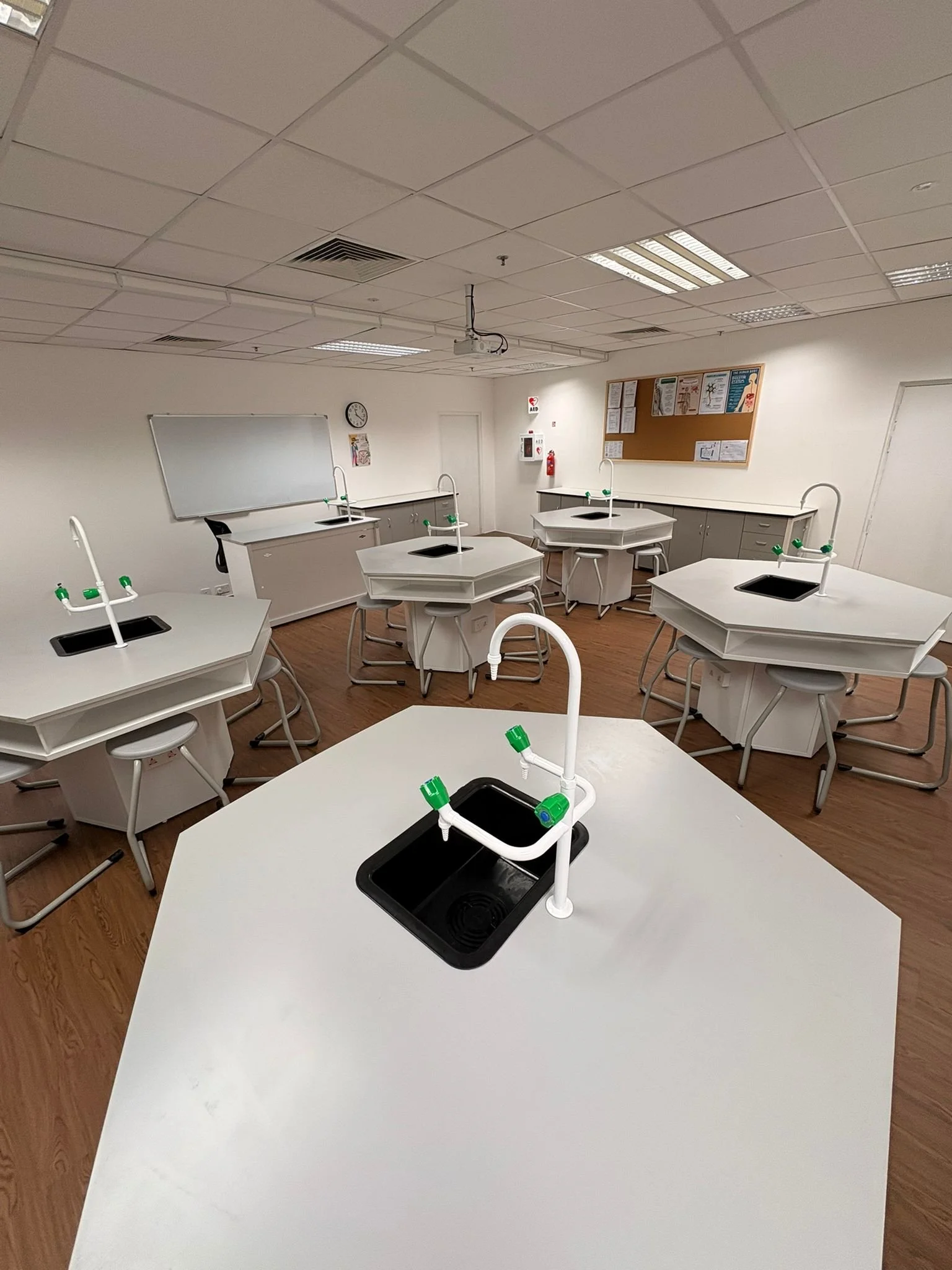 science lab with tables and chairs for cambridge students