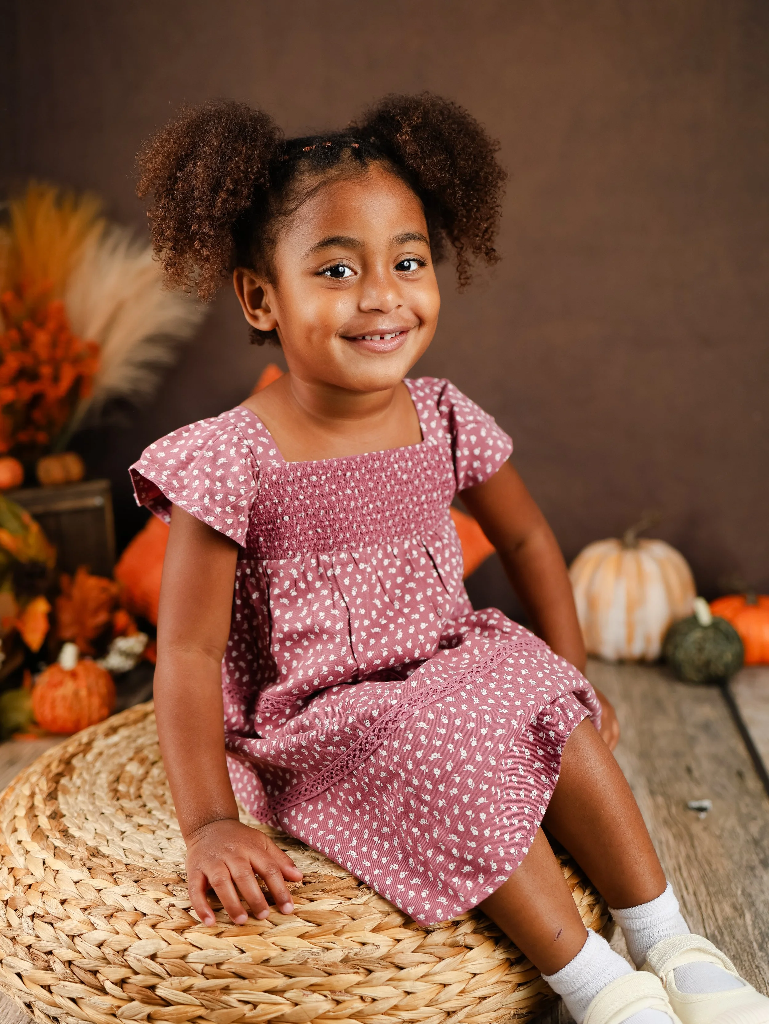 Preschooler in pink dress for fall photos in Merritt Island Florida