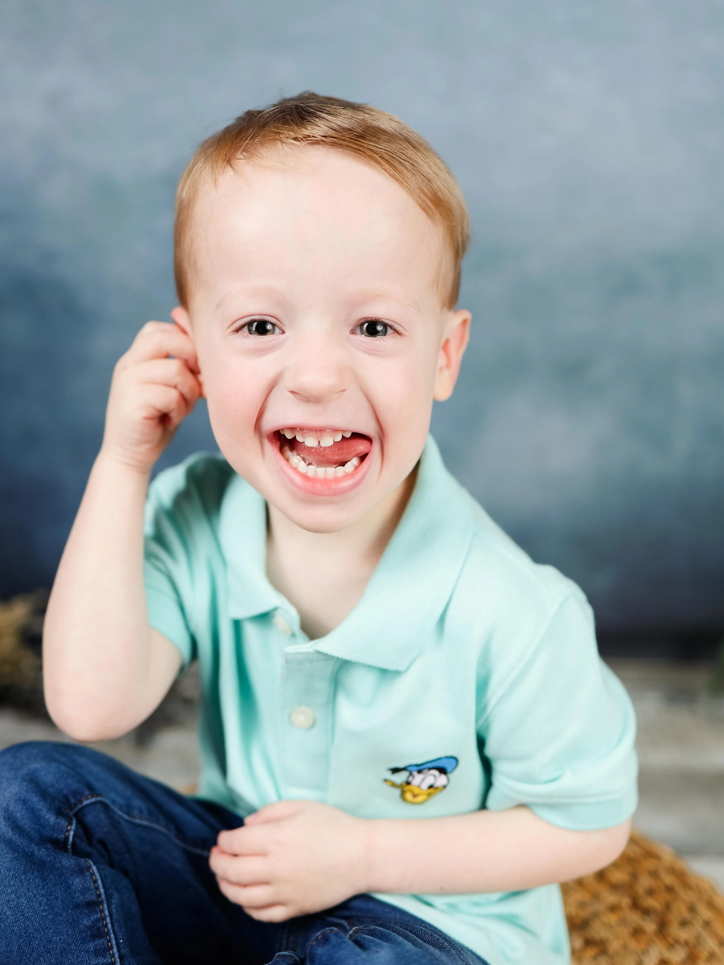 preschooler with joyful expression space coast photographer for school portraits in Rockledge Florida with Those Photo Ladies