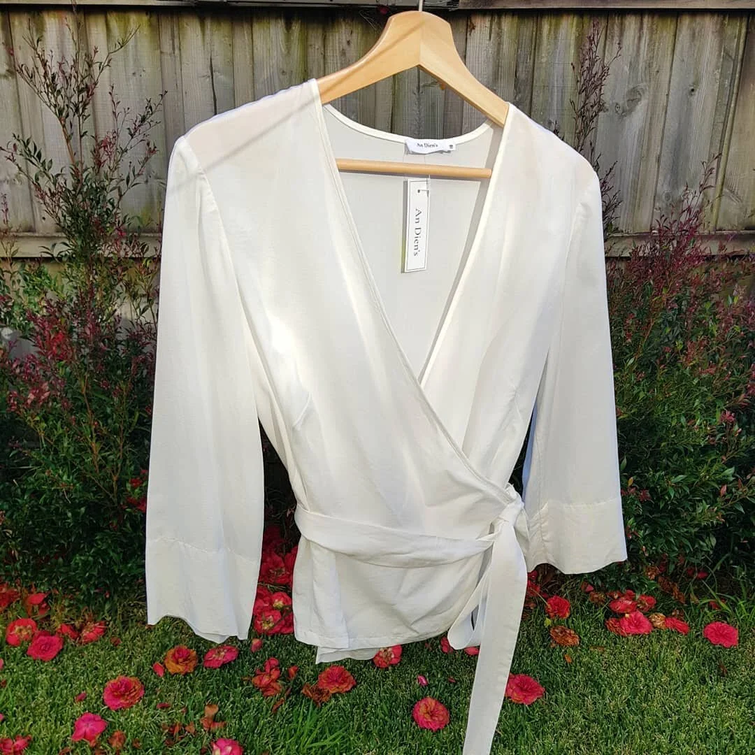 Dear all, we have recently introduced free shipping for all domestic orders! 🎉 We're also available to help with sizing, if you're unsure just send us an email at hello@AnDiens.com. Our Celine Wrap top hanging here in the cool breeze, made in tencel