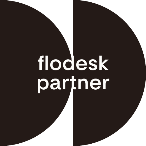 Logo with text "flodesk partner" on a black semi-circle background.