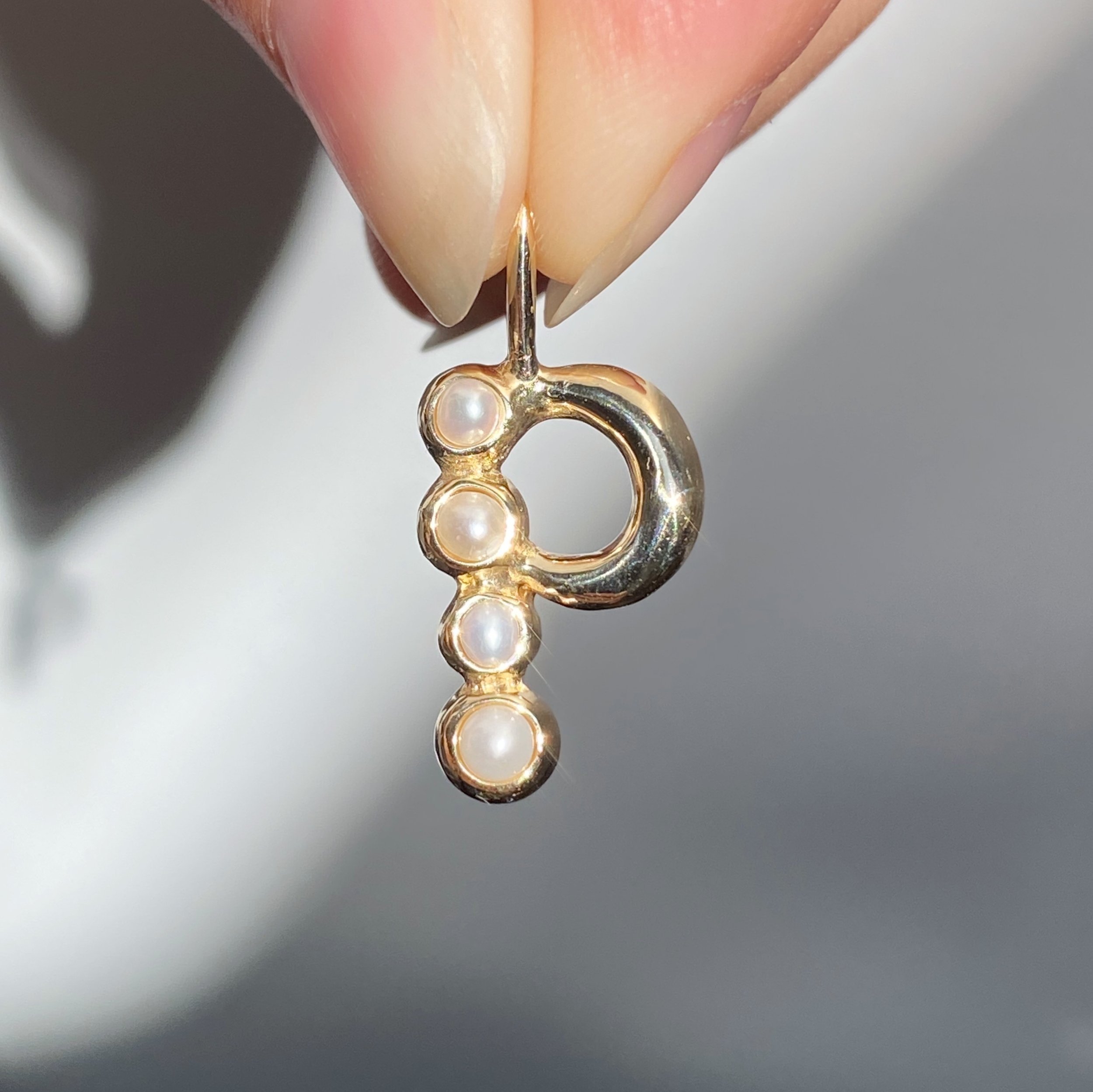 P INITIAL CHARM