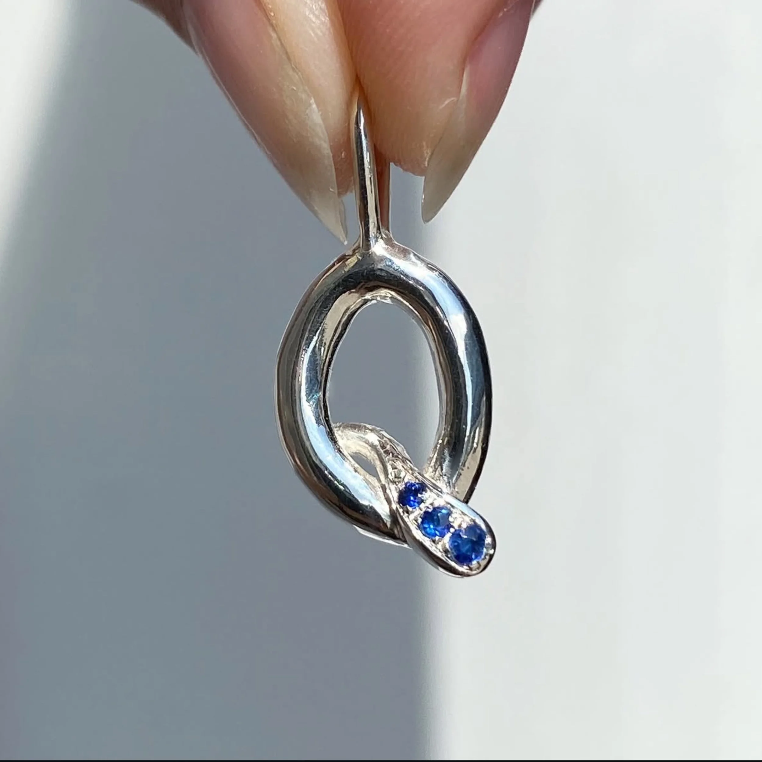 Q INITIAL CHARM
