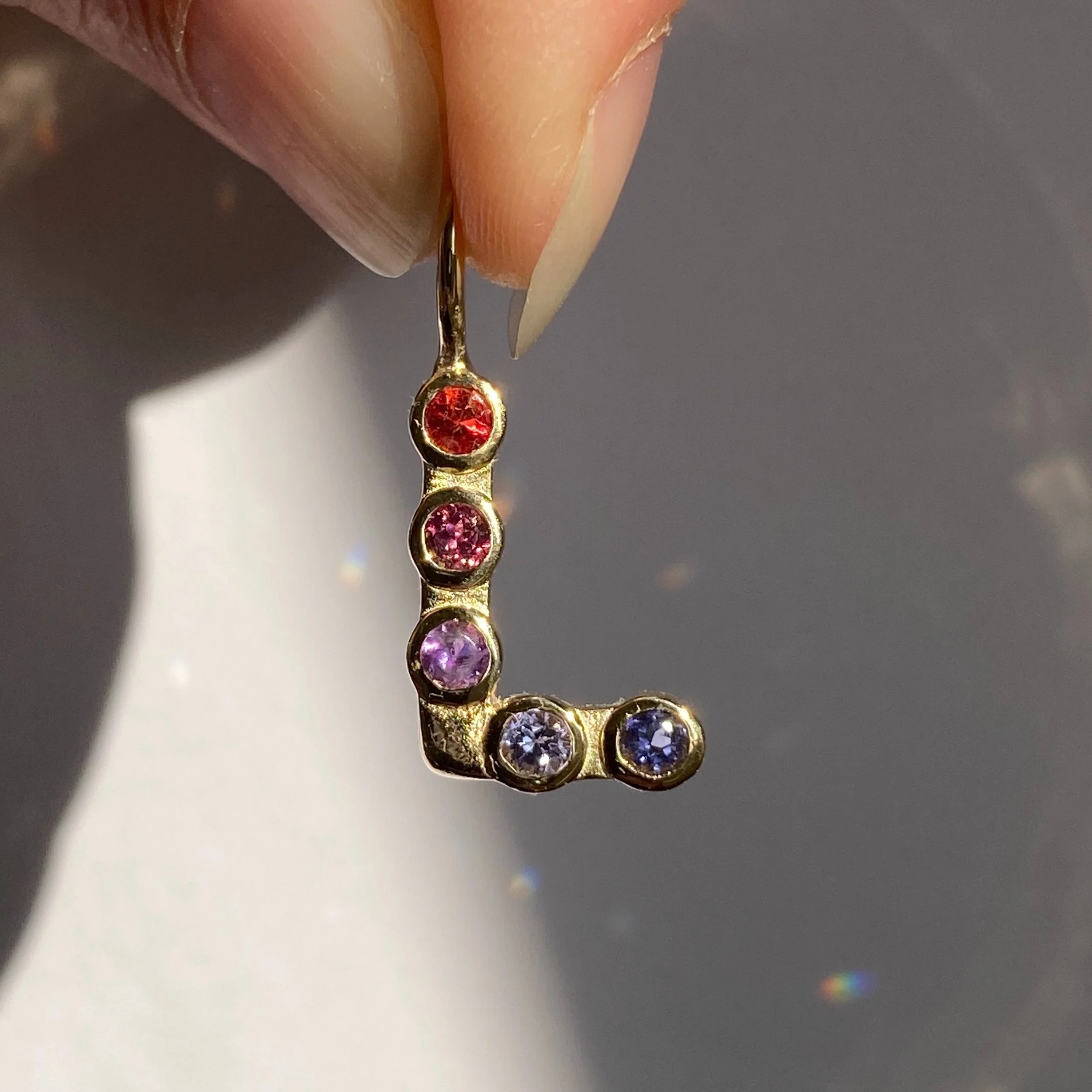 L INITIAL CHARM