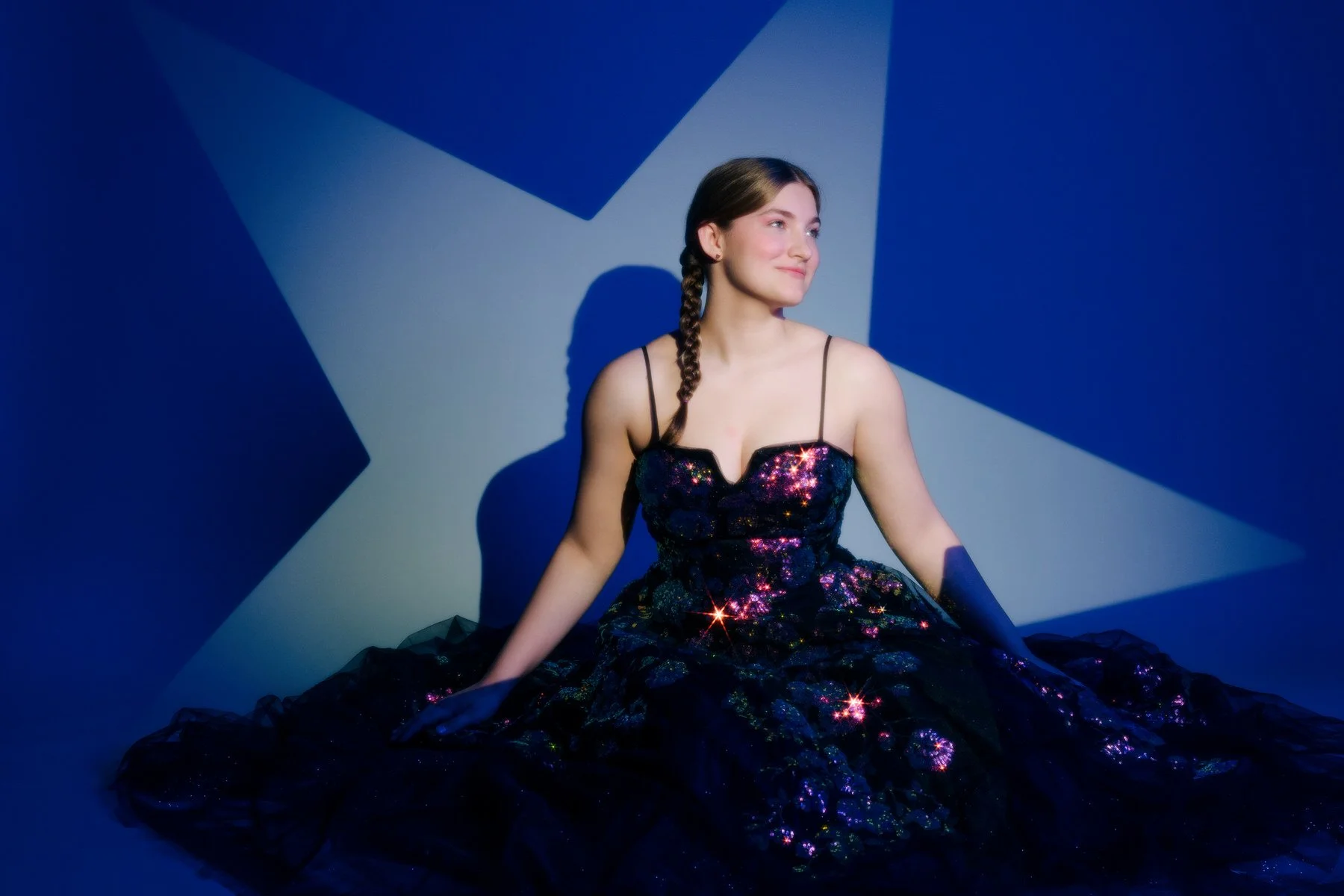 Stylized senior portrait with colorful shimmer dress and star lighting, Palmer Alaska