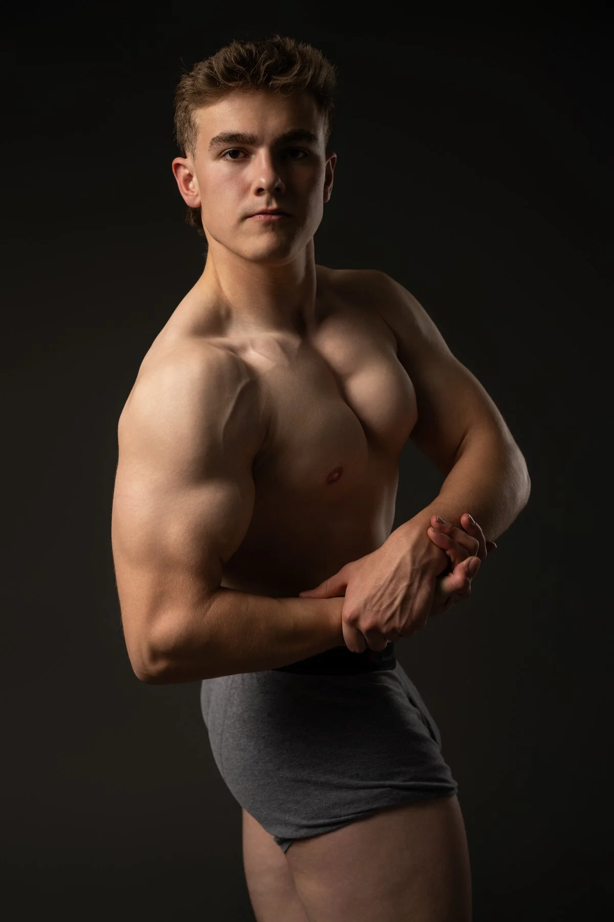 Body builder holding a pose for a portrait
