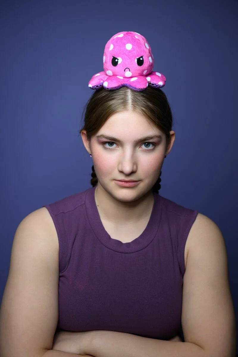 Girl wearing an angry octopus on her head