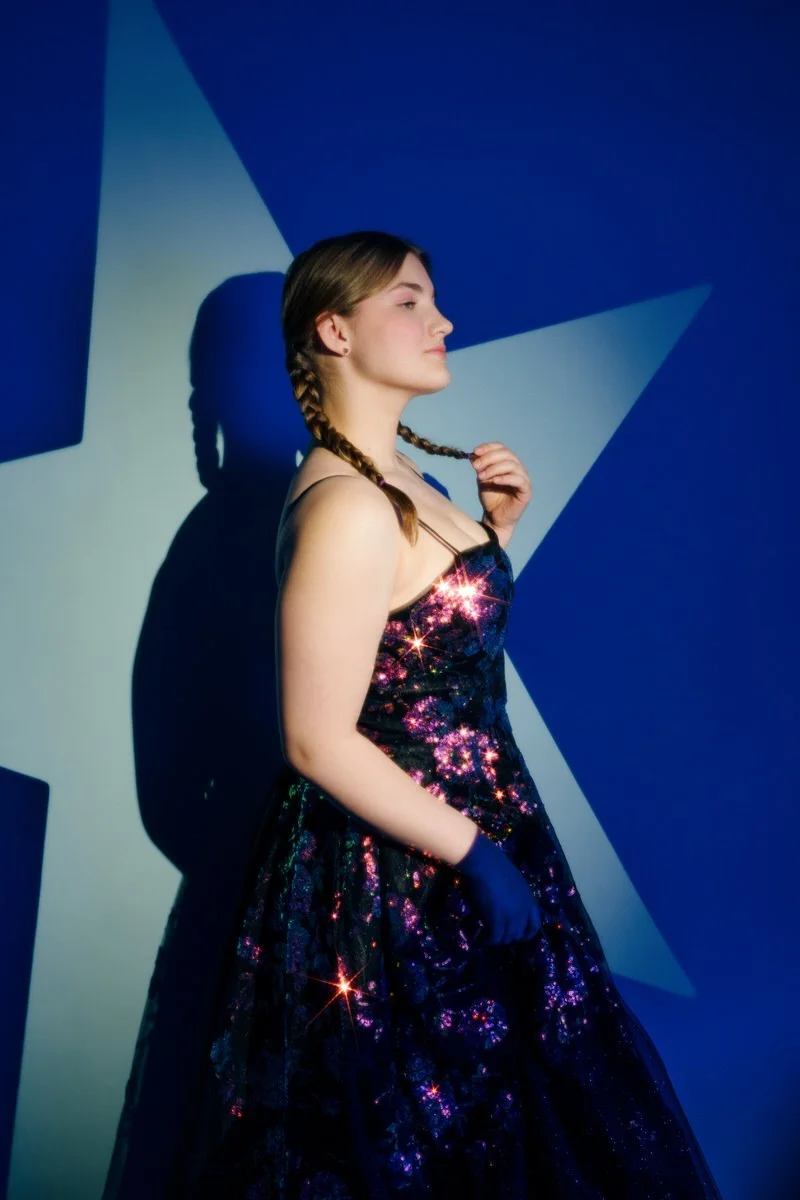 Confident senior girl portrait with braids and glowing dress, studio photography Palmer Alaska