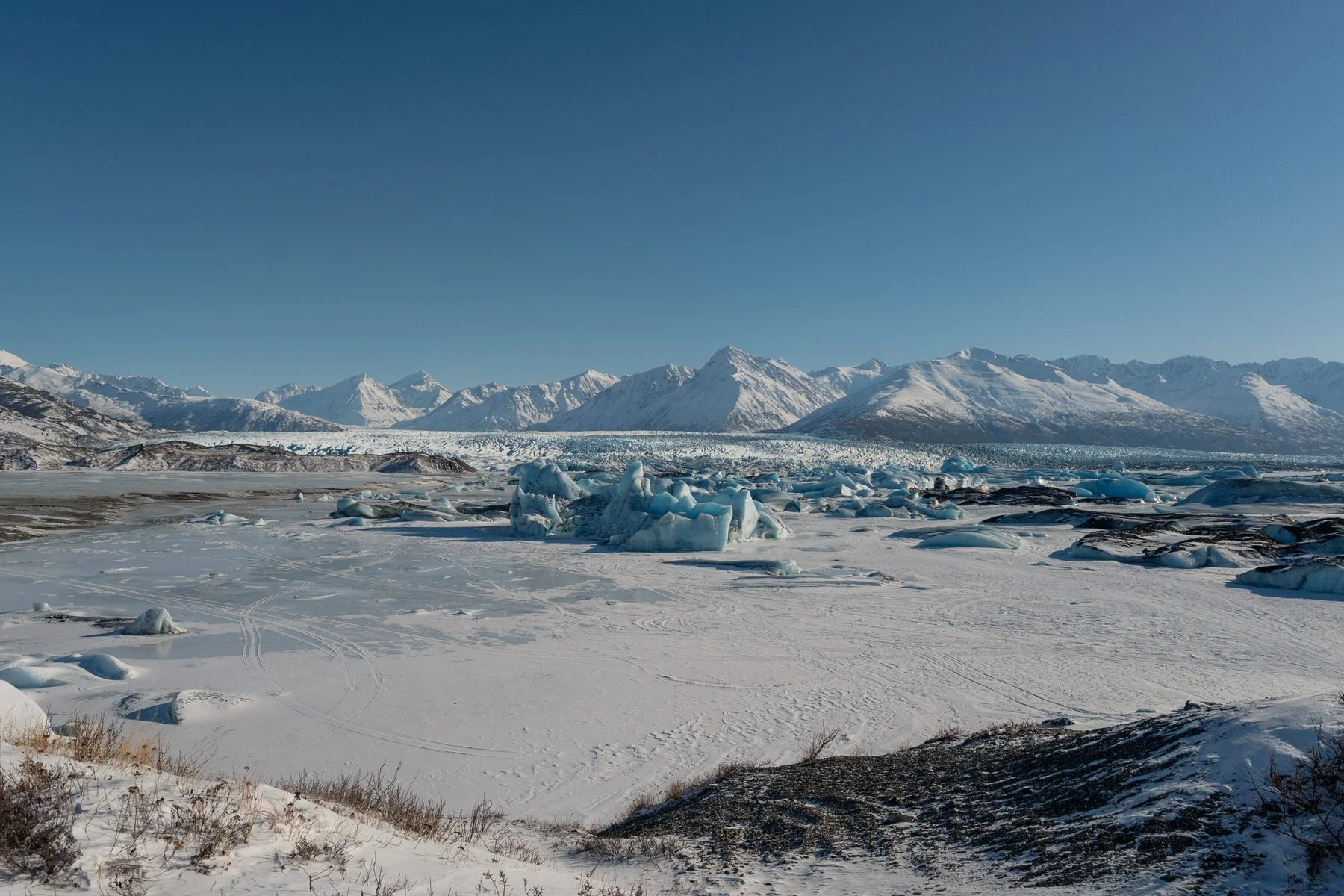 Photo of the knik glacier and icebergs in a like
