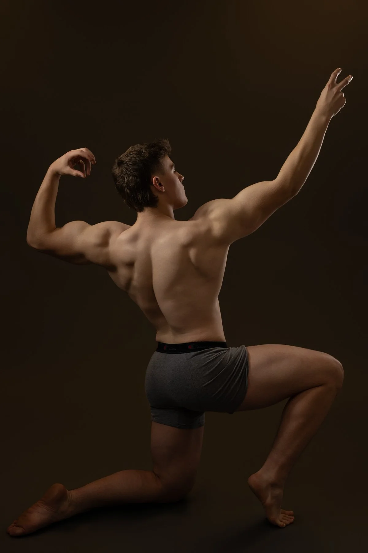 Body Builder holding a pose for a portrait