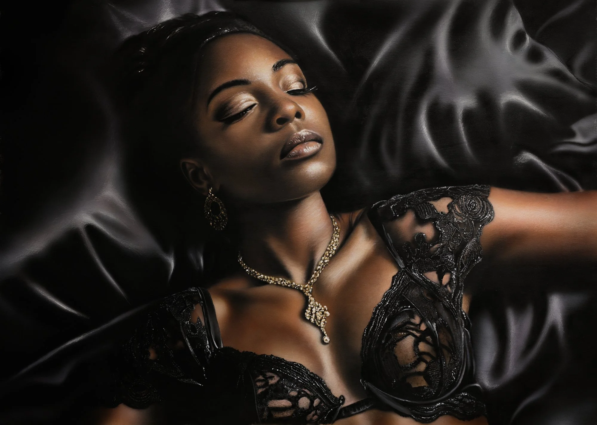 Black Beauty by Johannes Wessmark, a reclining woman in black lace lingerie and jewellery against glossy black satin.