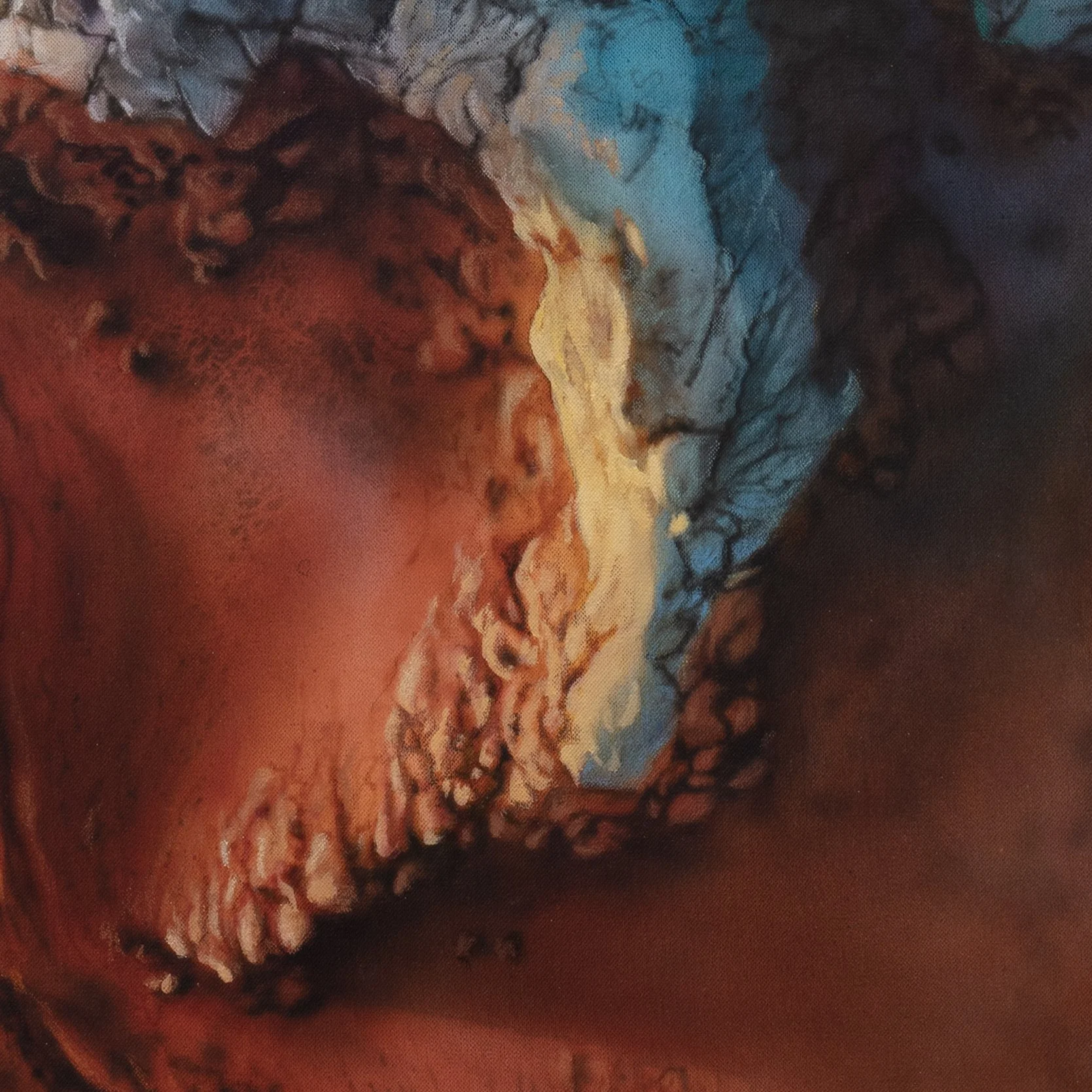 Badlands 2 by Johannes Wessmark, an aerial desert landscape with eroded ochre ridges, rust-coloured gullies and blue shadows.