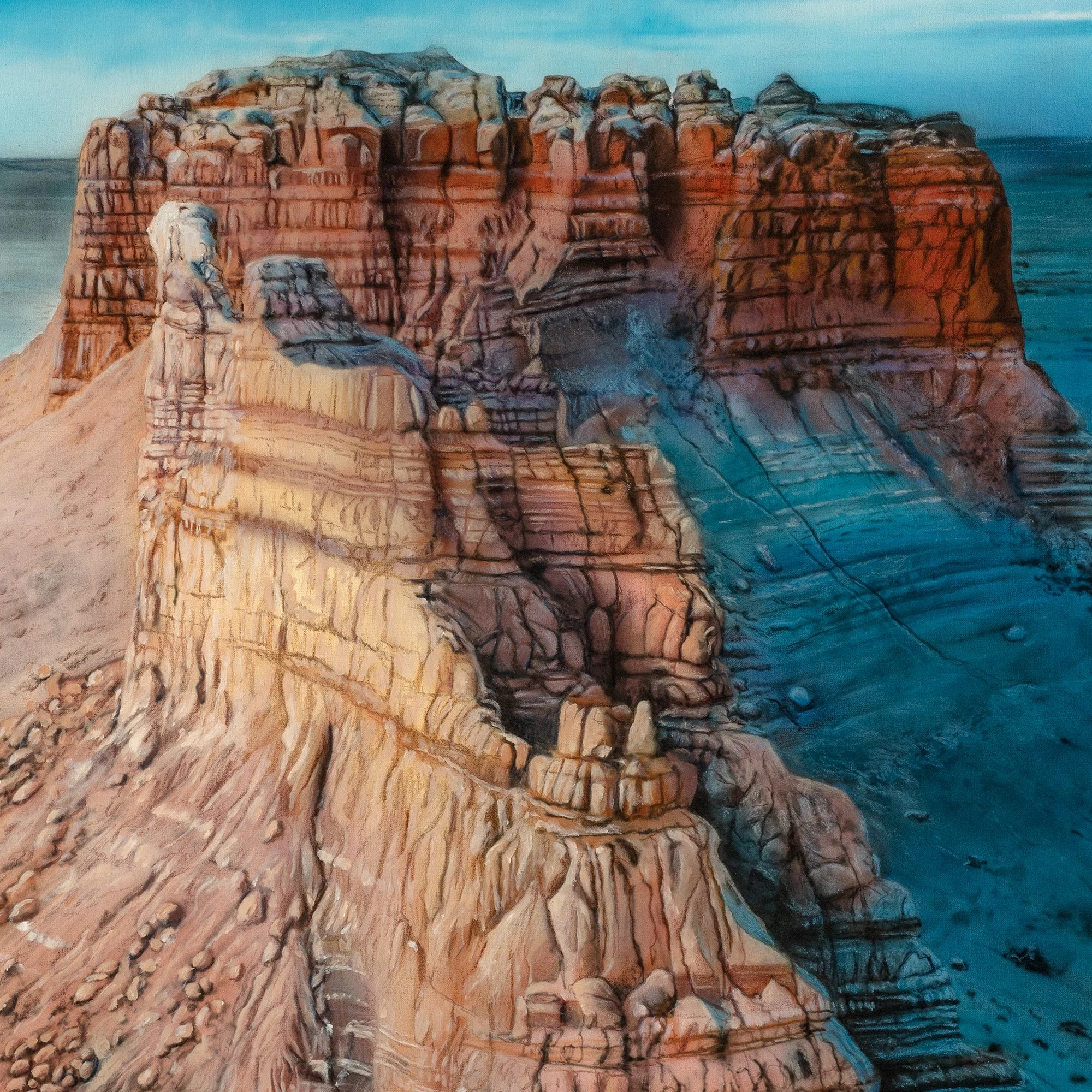 Badlands 1 by Johannes Wessmark, a flat-topped desert rock formation with layered orange cliffs and a long blue shadow.