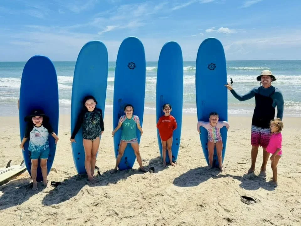 Surfing with Family is the Best Activity To-Do on the Outer Banks 