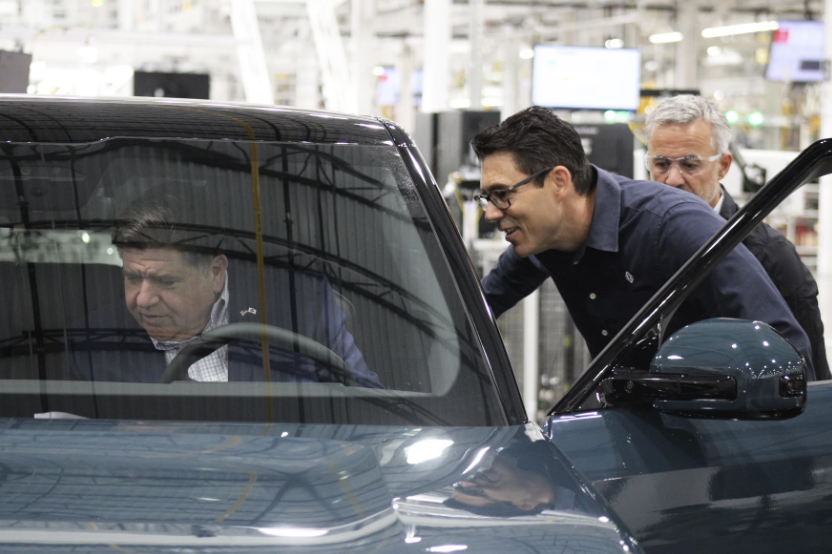 During Rivian visit, Pritzker says new R2 model could open EV market to the middle class