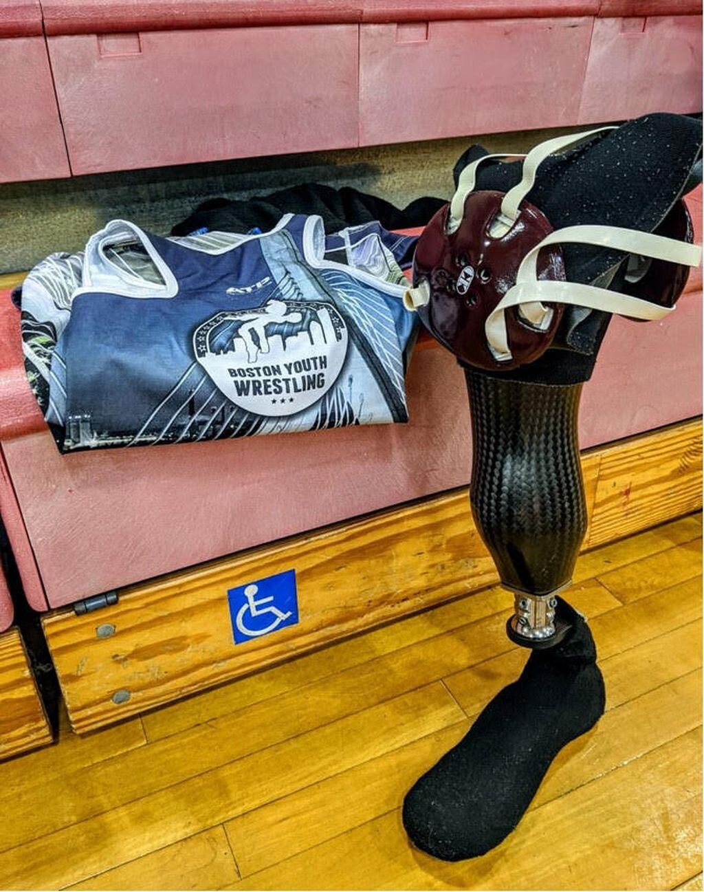 When Dorchester's Malaky Lewis is competing on the wrestling mat, he sheds his prosthetic right leg. COURTESY PHOTO