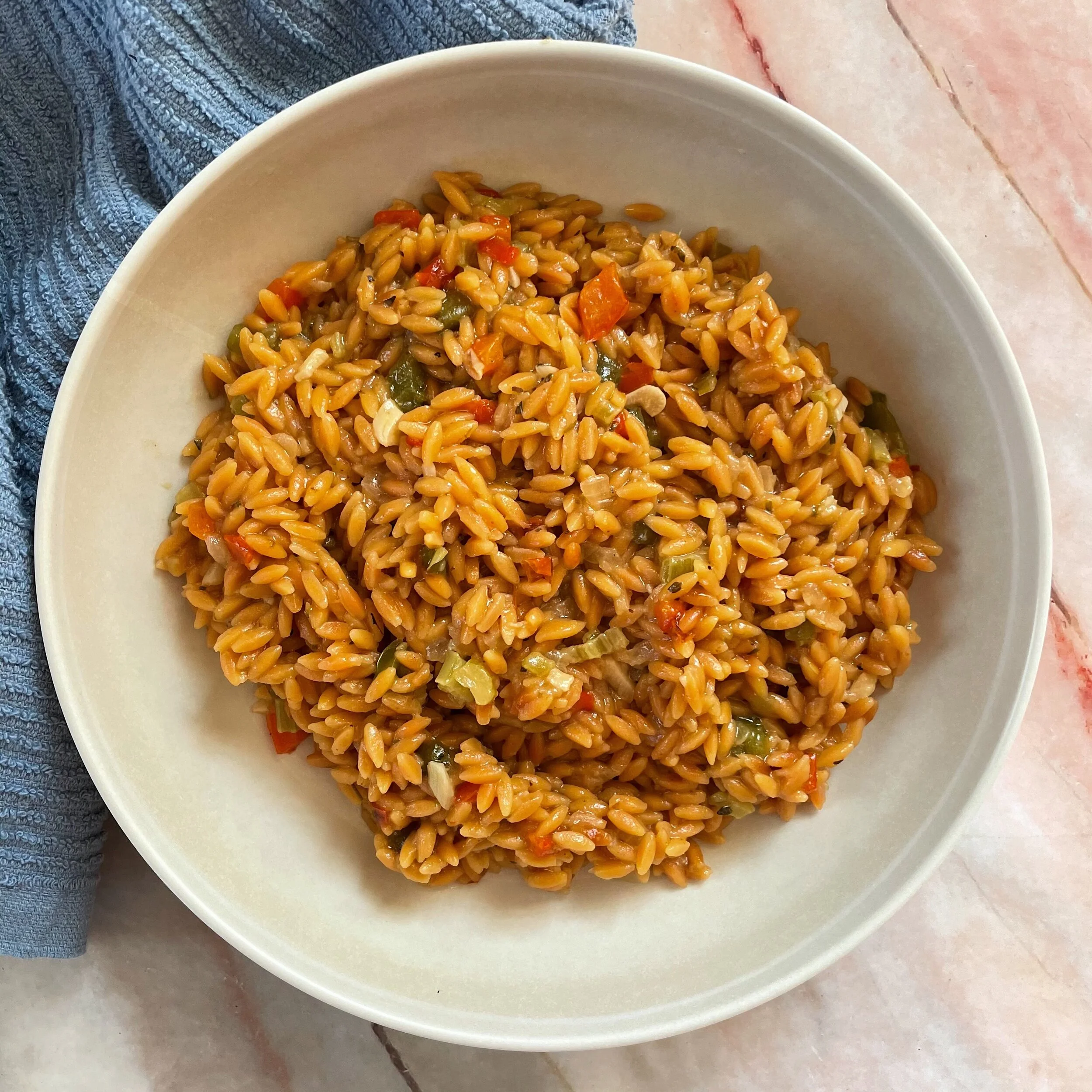 Leftover ingredients turned into warming, cozy, simple risotto made from Trader Joe’s organic chickpeas & red lentil risoni, and Kettle and Fire bone broth.  This recipe by Flavcity was so easy to follow that I was able to substitute in some bel…