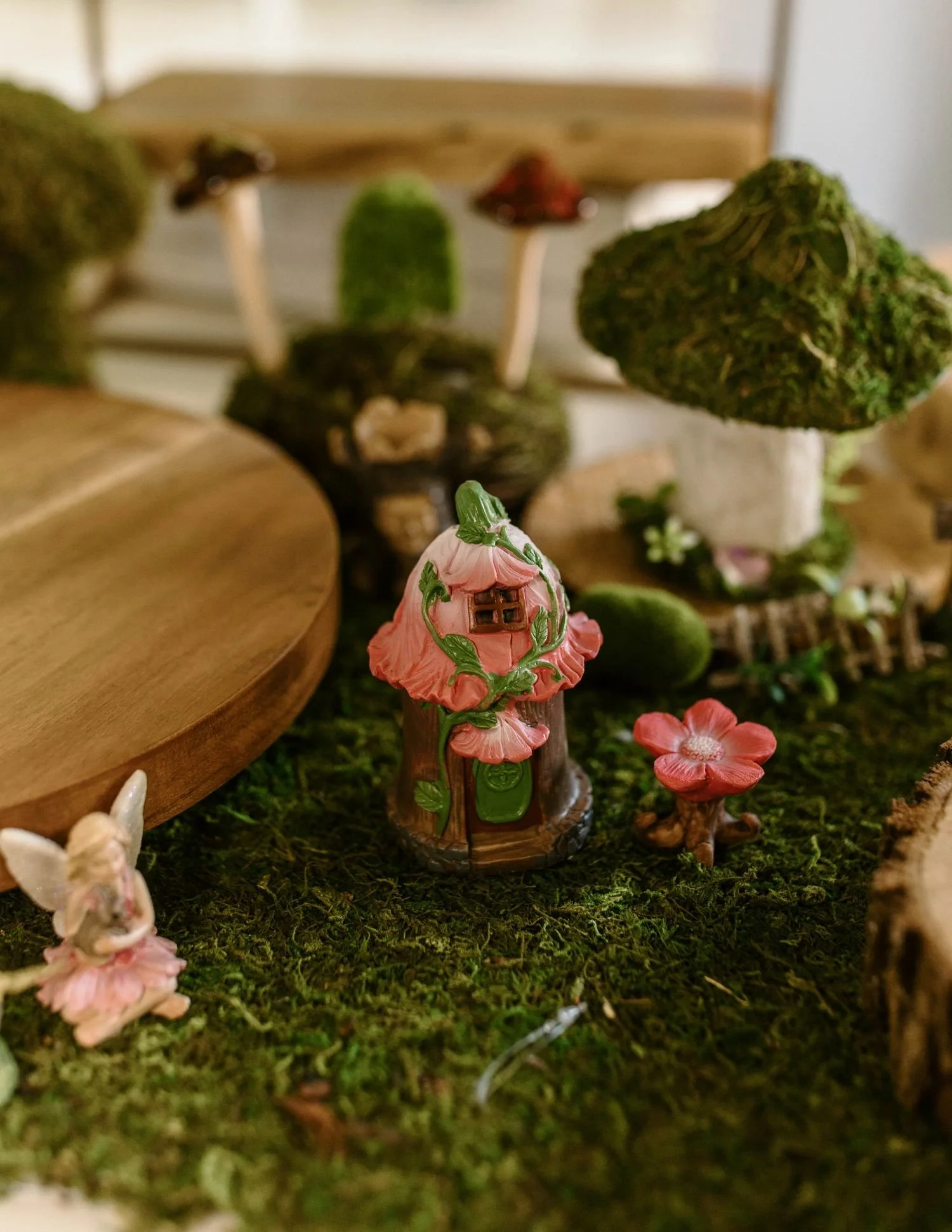 An enchanting fairytale table display for a wedding reception hosted at Historic Jasmine, a dreamy wedding venue in New Kent, Virginia.