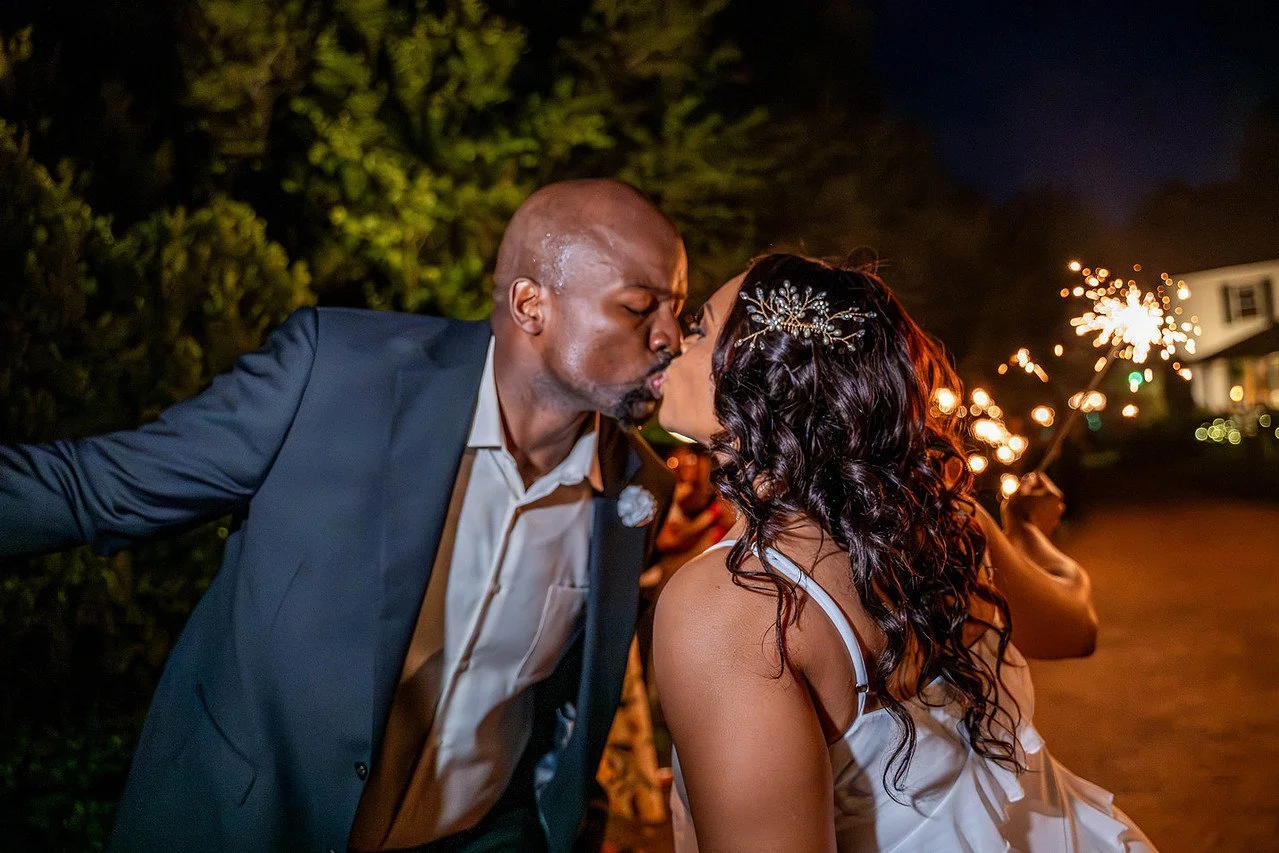 A bride and groom kiss at their post wedding  send-off | Historic Jasmine, a private wedding venue in New Kent, Virginia.