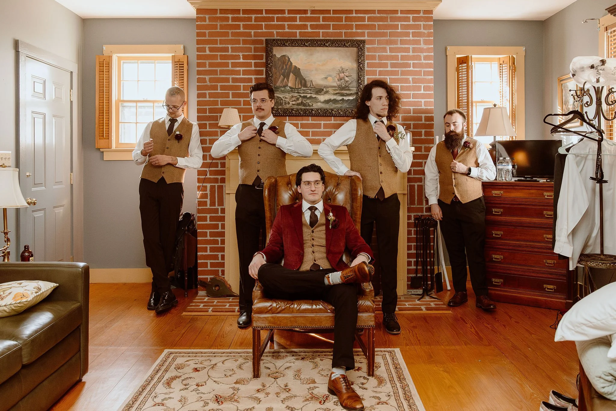 Groom and his groomsmen posing in the Study before the wedding ceremony at Historic Jasmine, a private wedding venue in Greater Richmond, Virginia.