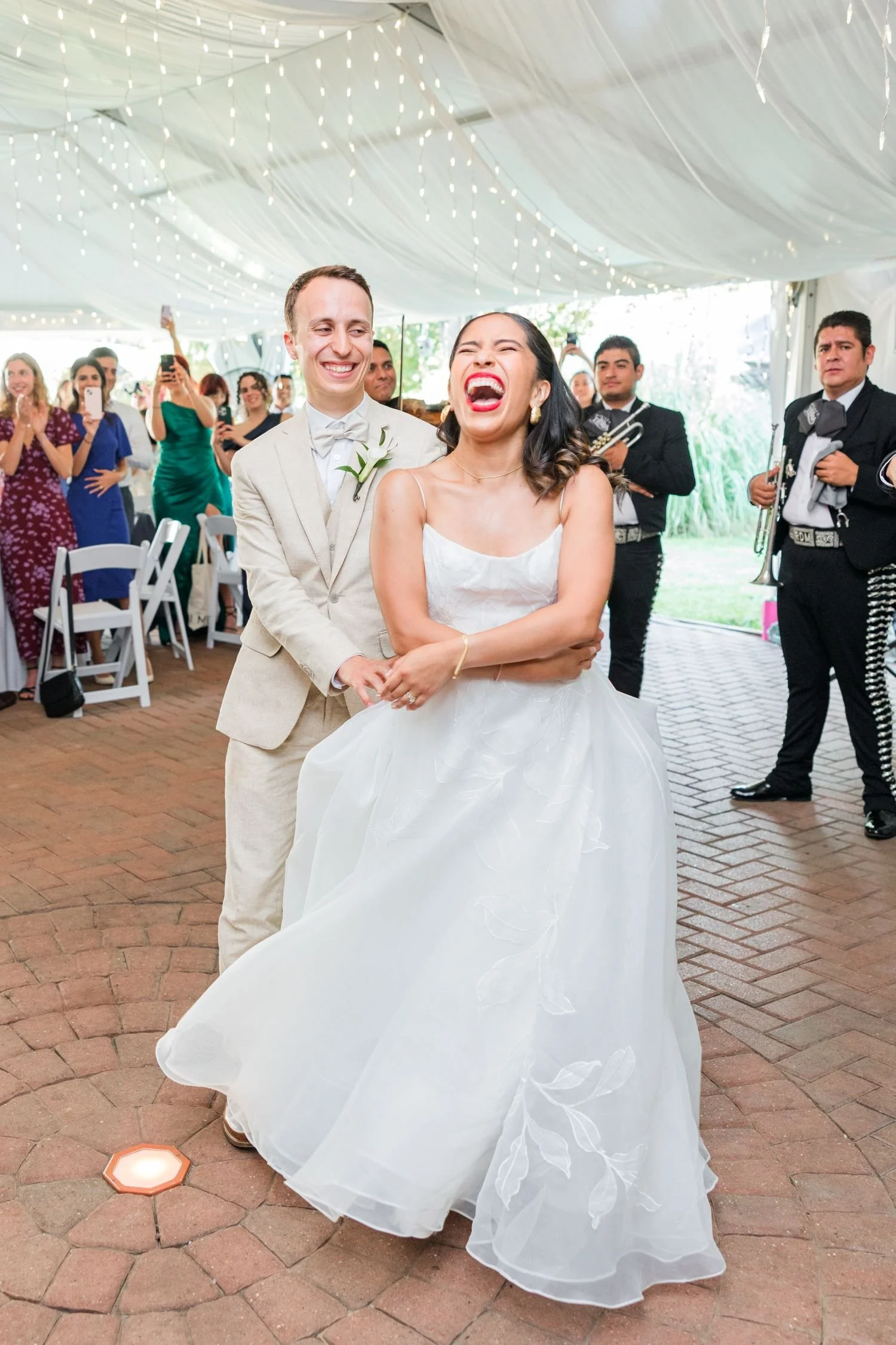 A bride and groom's first dance at their summer wedding reception at Historic Jasmine, a private wedding venue near Richmond, VA