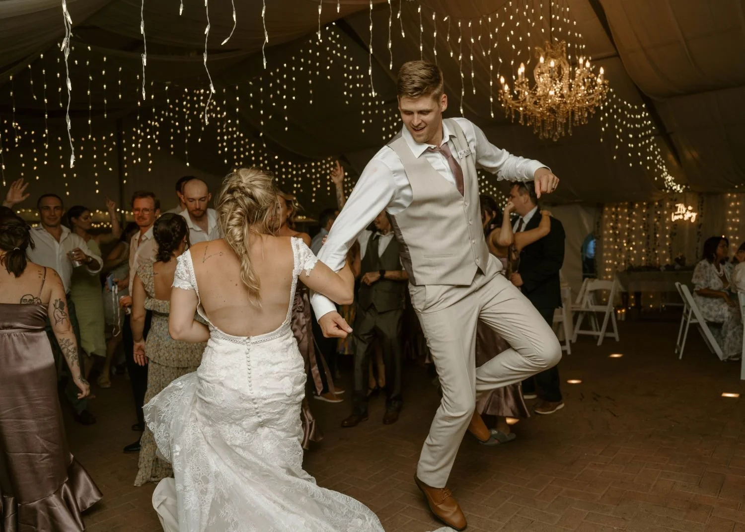A bride and groom dance the night away at their dreamy starlit wedding reception at Historic Jasmine, a private event venue near Richmond, Virginia.