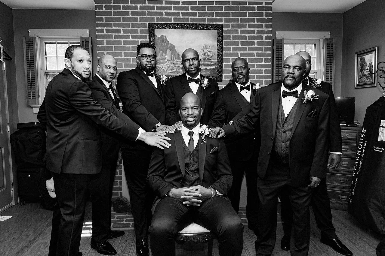 A groom and groomsman in the Study before the ceremony | Historic Jasmine, a private wedding venue in New Kent, Virginia.