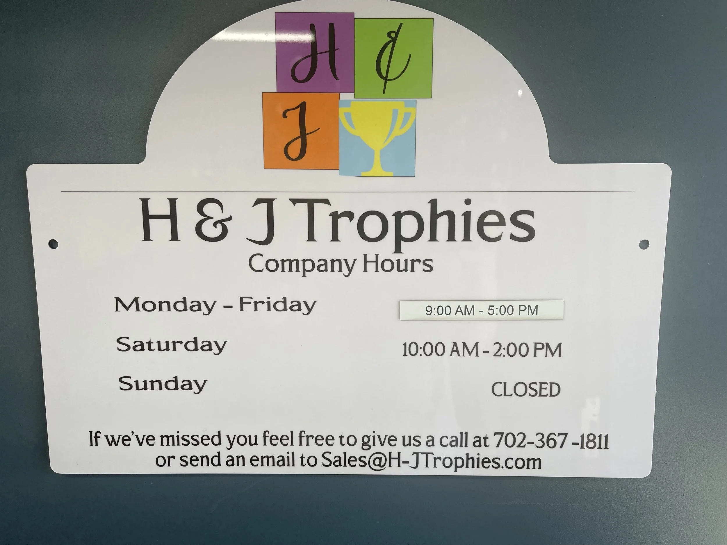 Store Hours Sign.jpg